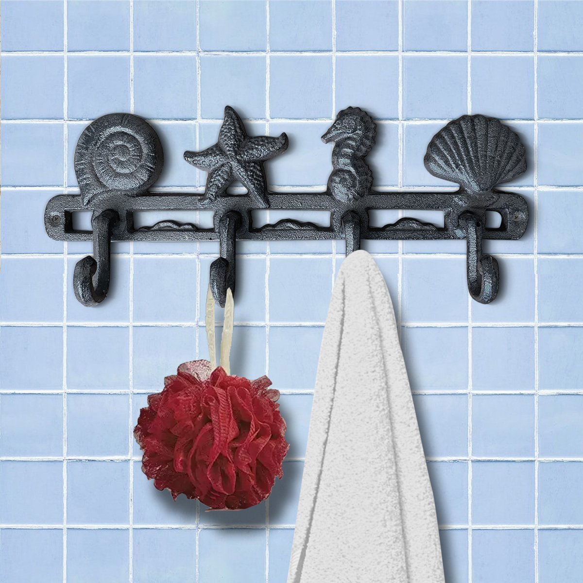 A pair of 13-inch cast iron seashell wall hooks, showcasing intricate detailing and a rustic finish, perfect for beach-themed decor.