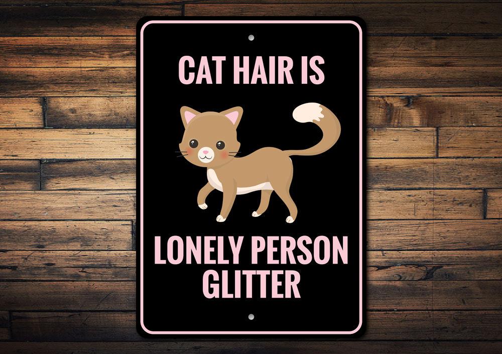 A humorous decorative sign reading 'Cat Hair is Lonely Person Glitter', made from quality aluminum, showcasing a playful design.