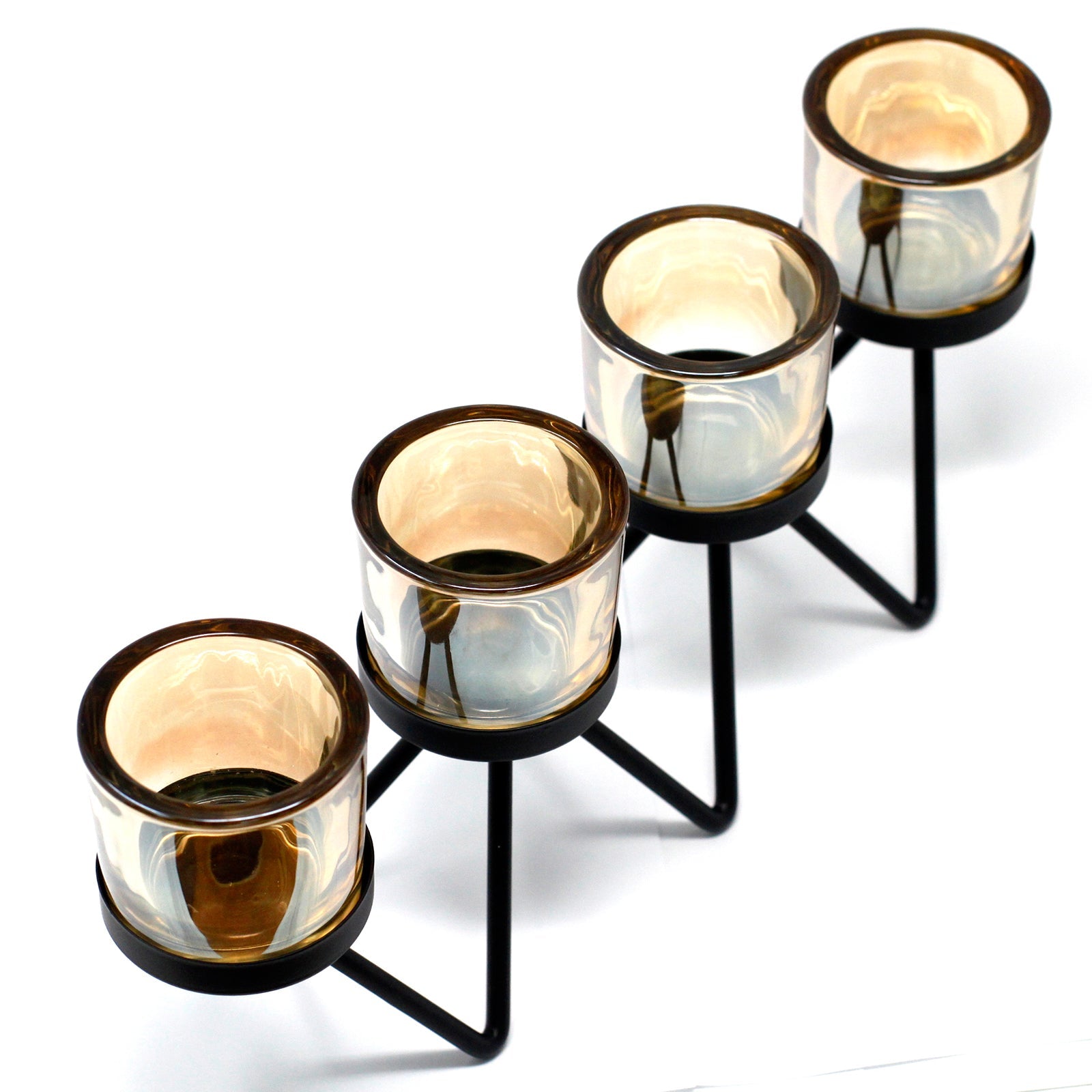 Centrepiece Iron Votive Candle Holder with 4 cups in a zig zag design, showcasing elegant iron craftsmanship.
