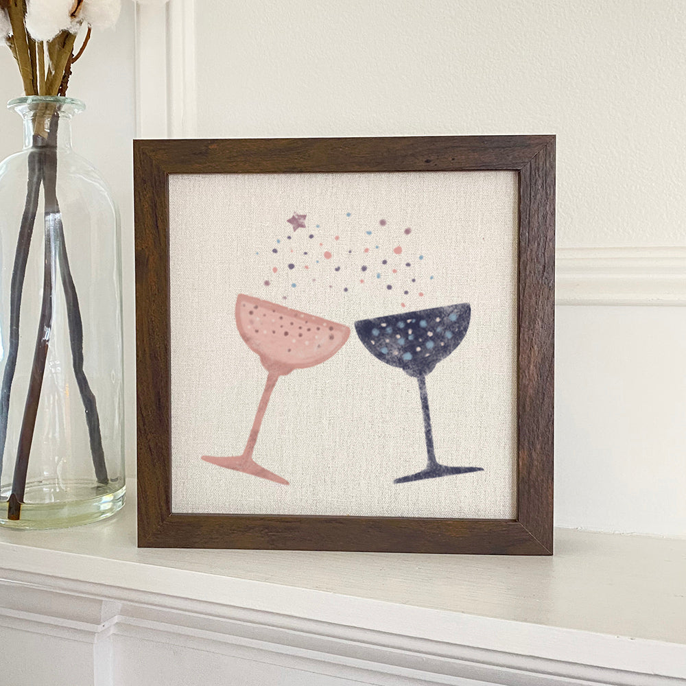 Champagne Toast framed sign with a stylish wood frame, featuring a linen-look background and eco-friendly ink printing.