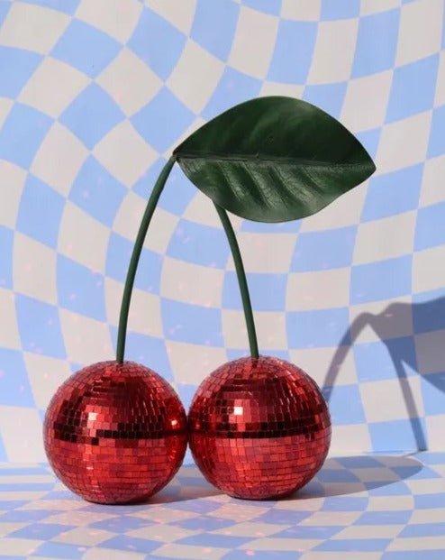 A vibrant Cherry Disco Ball featuring two shiny cherries, perfect for whimsical home decor and party decorations.