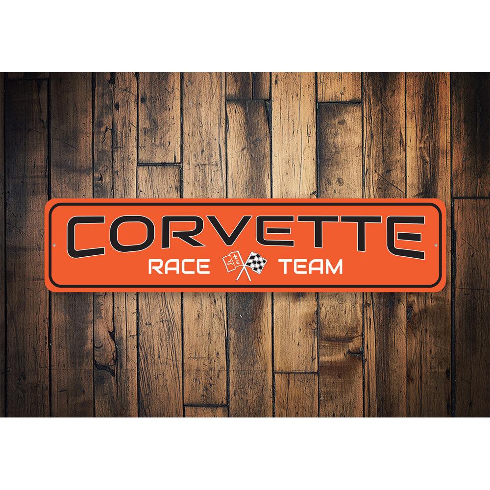 Chevy Corvette Race Team Sign made of durable aluminum, featuring vibrant colors and a racing theme, perfect for car enthusiasts.