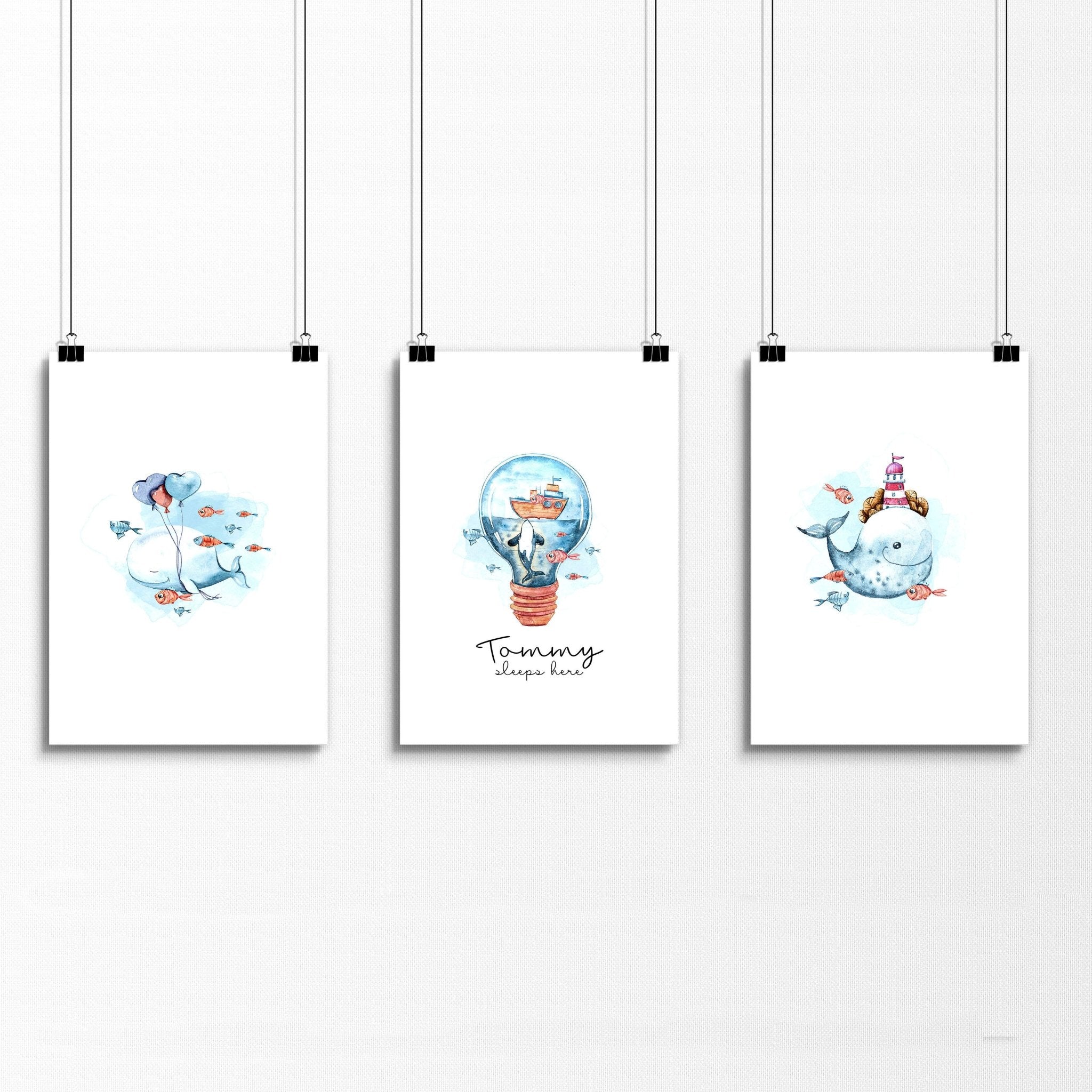 Set of 3 nautical wall art prints featuring majestic whales and enchanting ocean elements, perfect for a child's nursery or playroom.