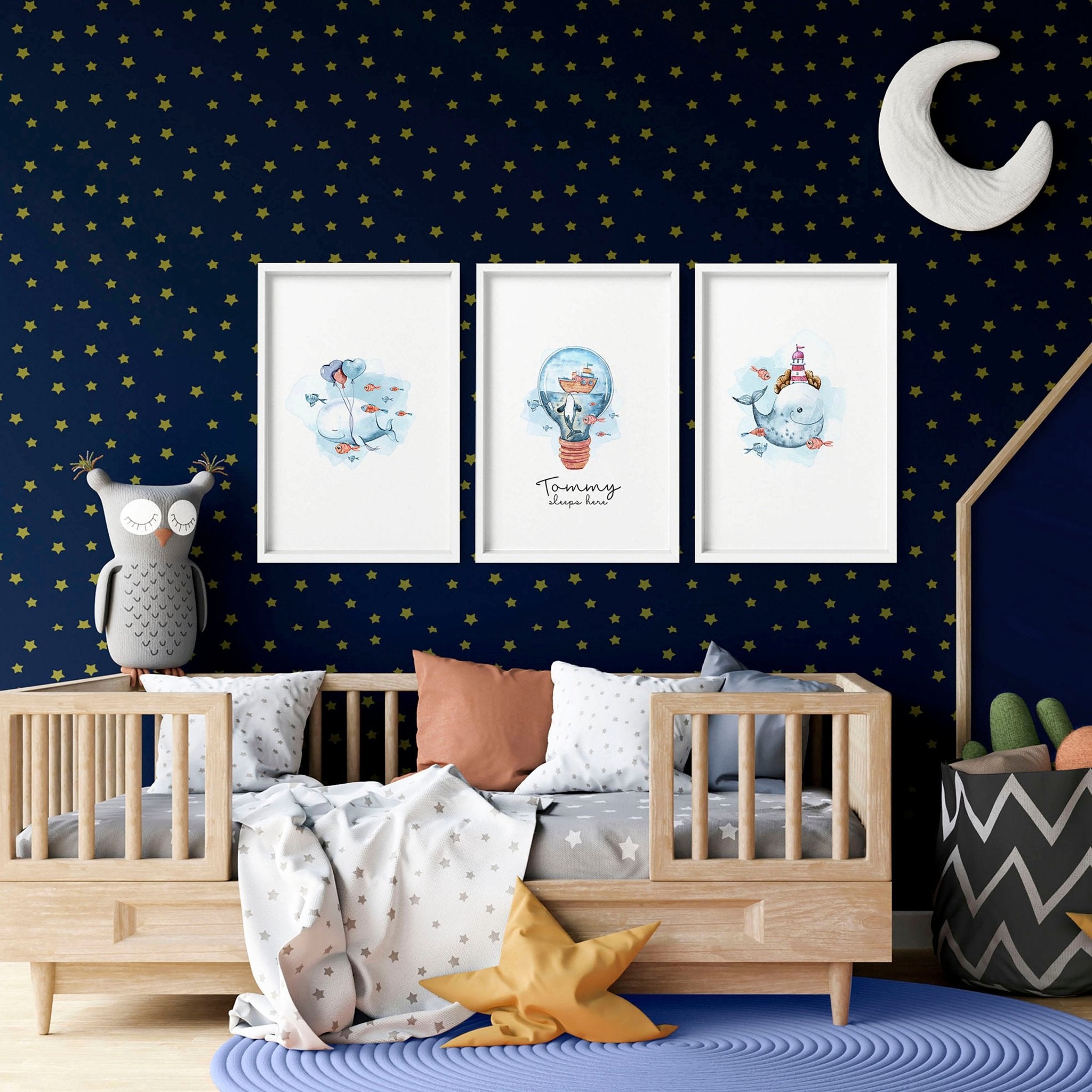 Set of 3 nautical wall art prints featuring majestic whales and enchanting ocean elements, perfect for a child's nursery or playroom.
