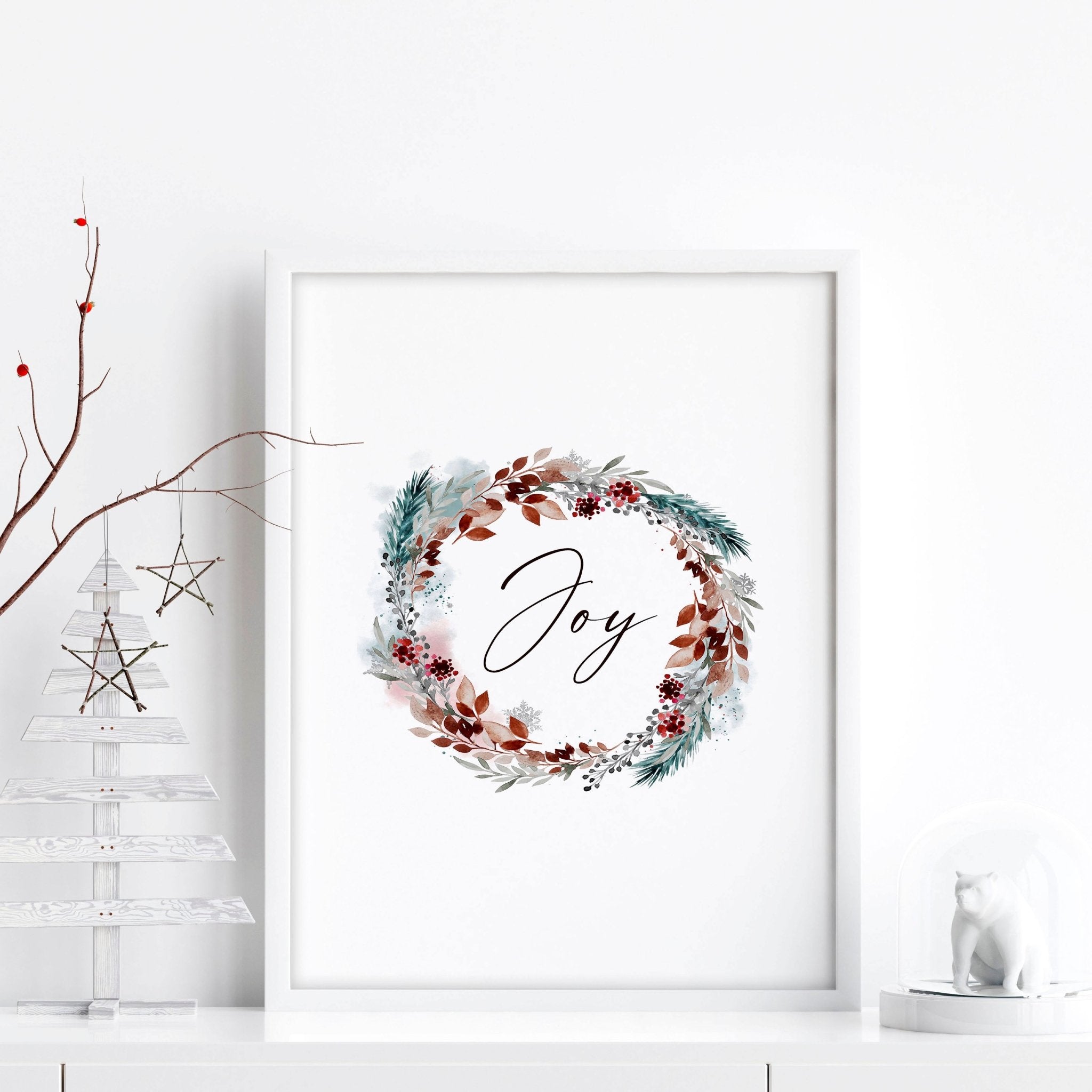 A vibrant watercolour wreath featuring holly leaves and berries with the word 'Joy' elegantly handwritten in the center, perfect for Christmas decor.
