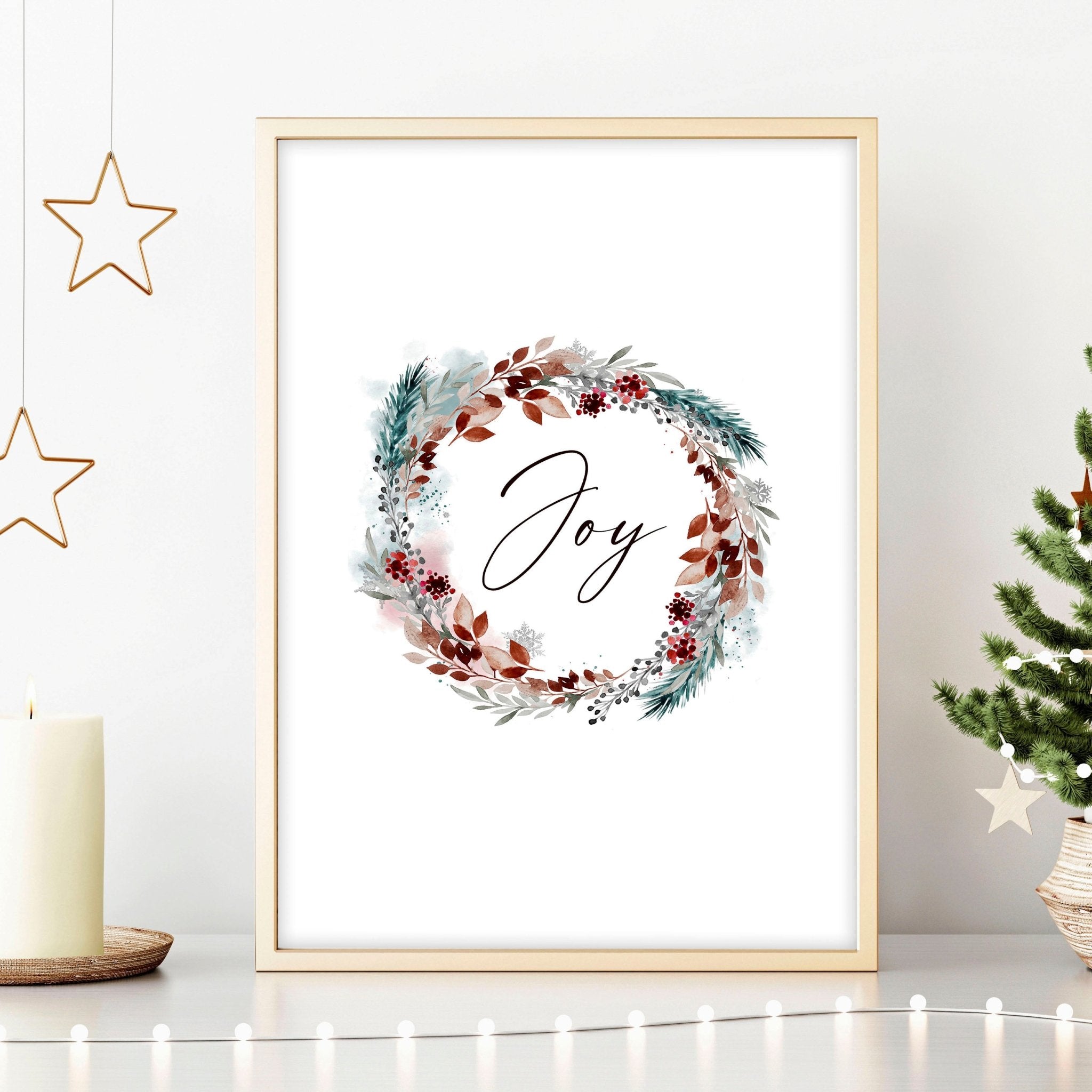 A vibrant watercolour wreath featuring holly leaves and berries with the word 'Joy' elegantly handwritten in the center, perfect for Christmas decor.
