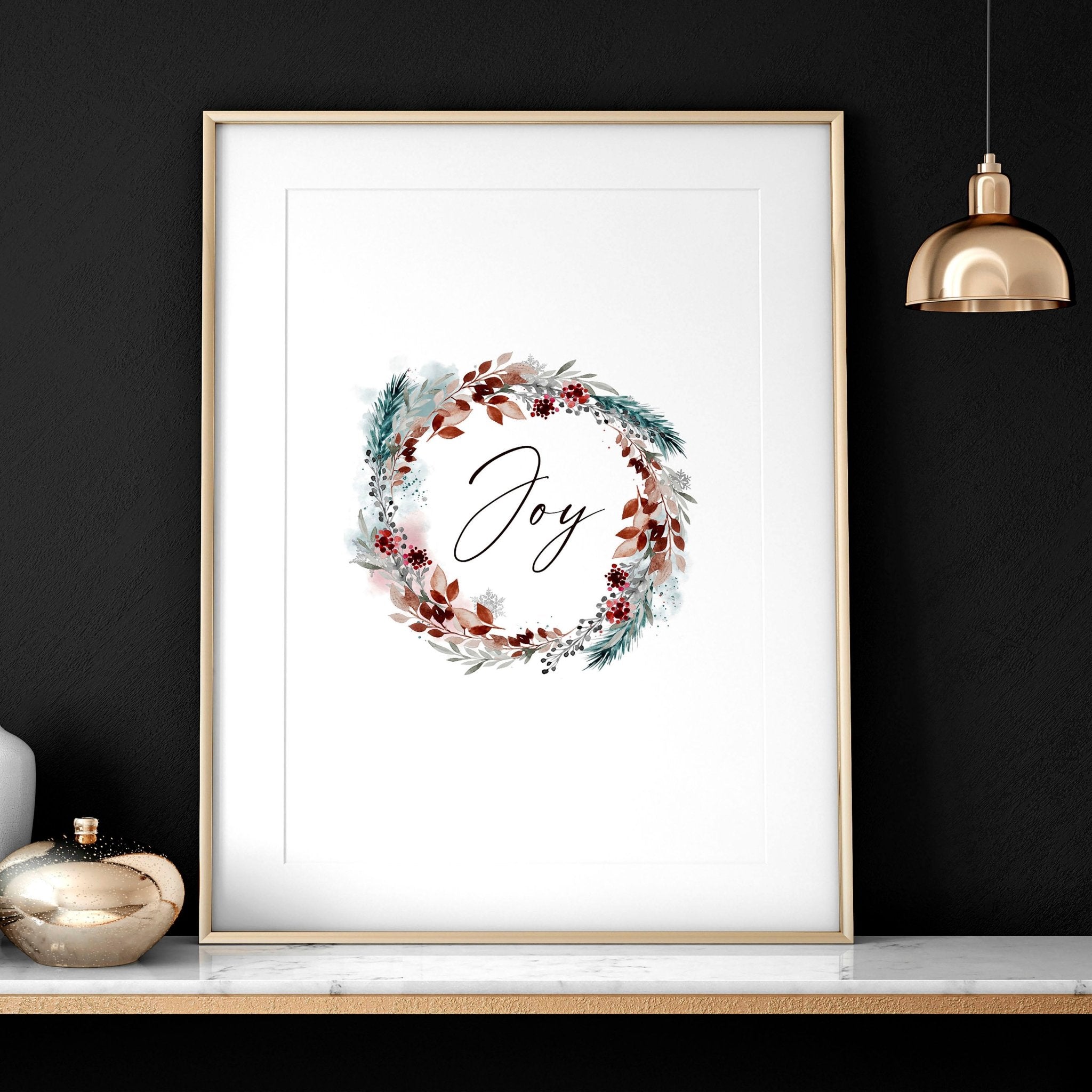 A vibrant watercolour wreath featuring holly leaves and berries with the word 'Joy' elegantly handwritten in the center, perfect for Christmas decor.