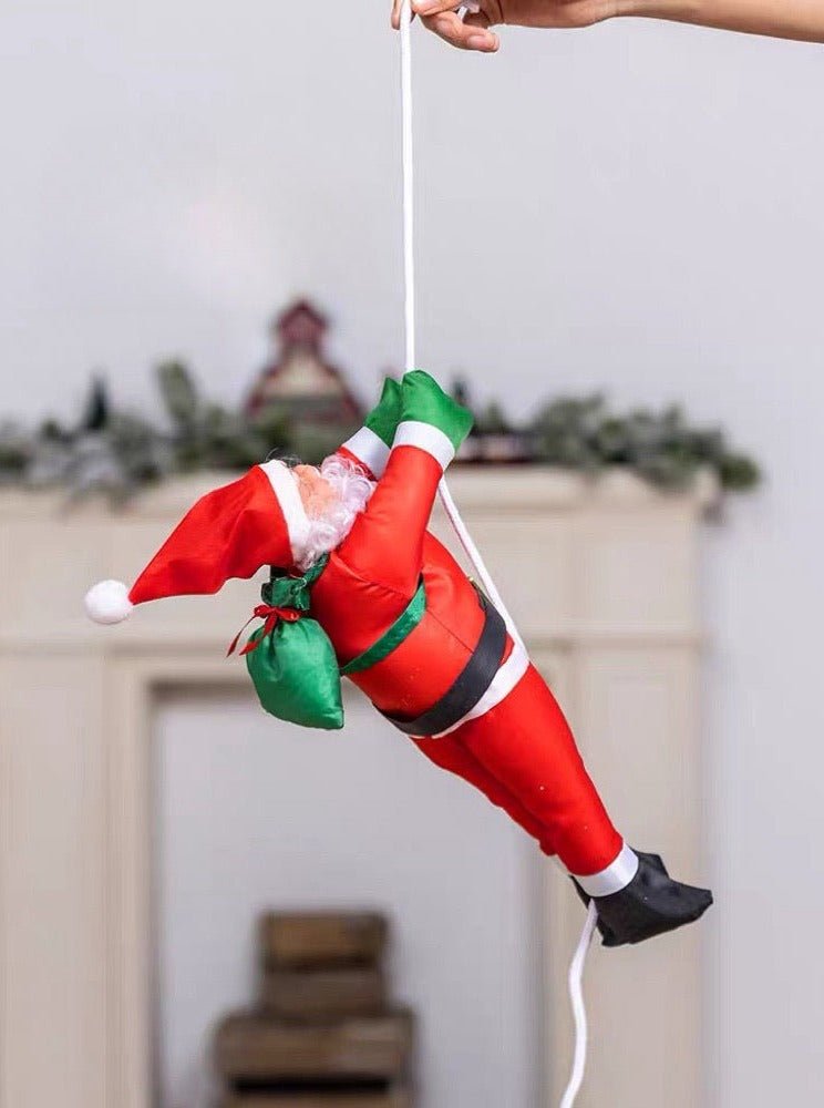 Christmas Electric Santa Decor featuring Santa climbing ropes and ladders, showcasing vibrant colors and detailed craftsmanship.