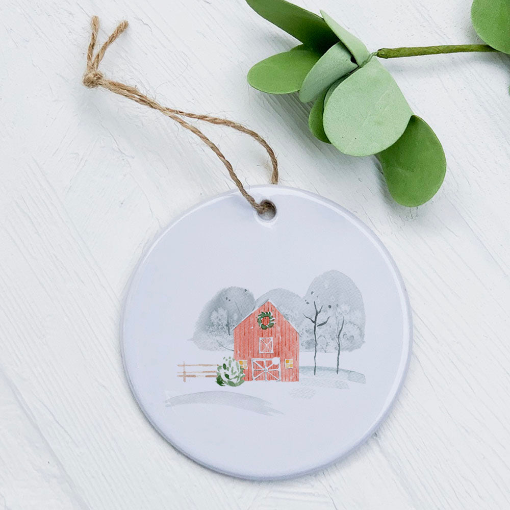 A beautifully crafted porcelain Christmas Farm Ornament featuring original designs, perfect for holiday decor or gifting.