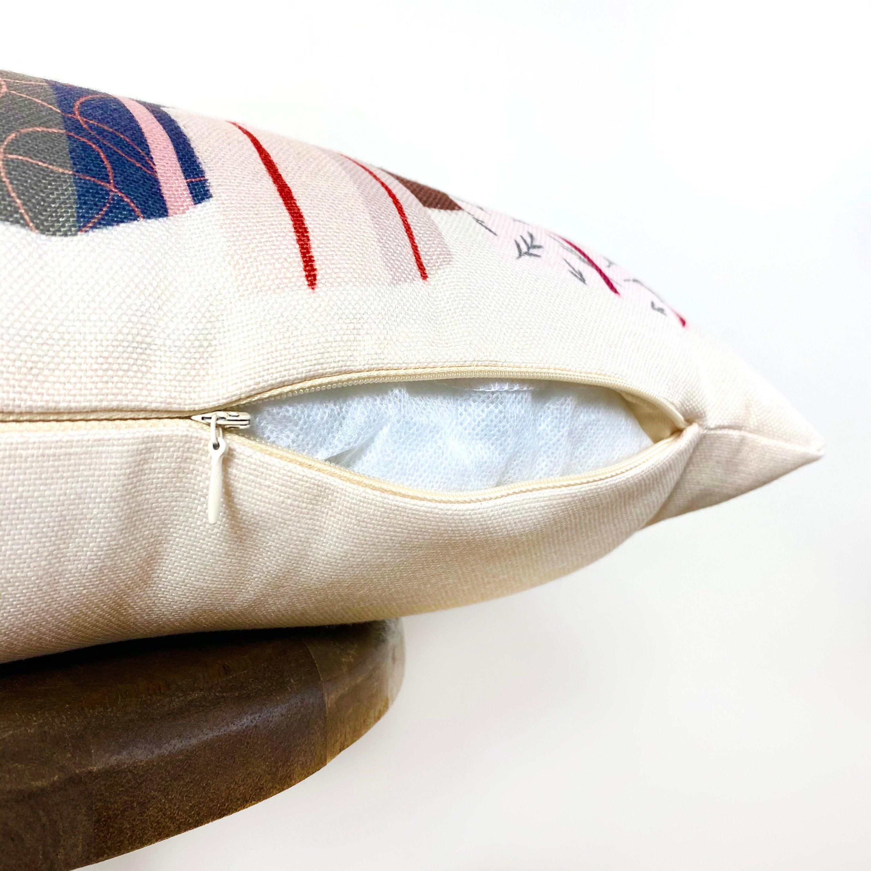 Christmas Gift Train throw pillow cover featuring a toy train carrying wrapped presents on a cream background, perfect for holiday decor.