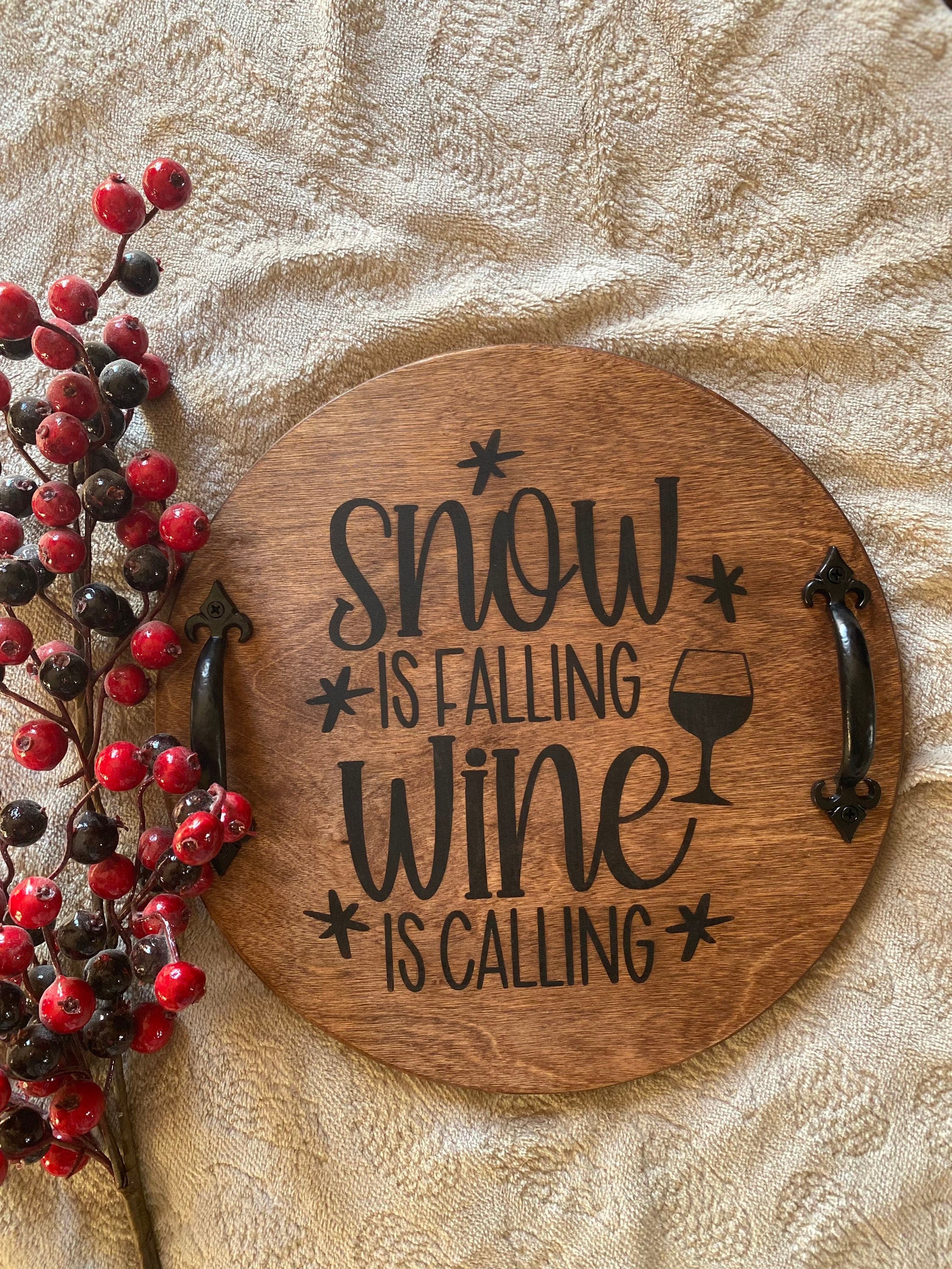 Handmade rustic Christmas serving tray made of birch plywood with a rich chestnut stain and black metal handles, showcasing unique wood grain patterns.