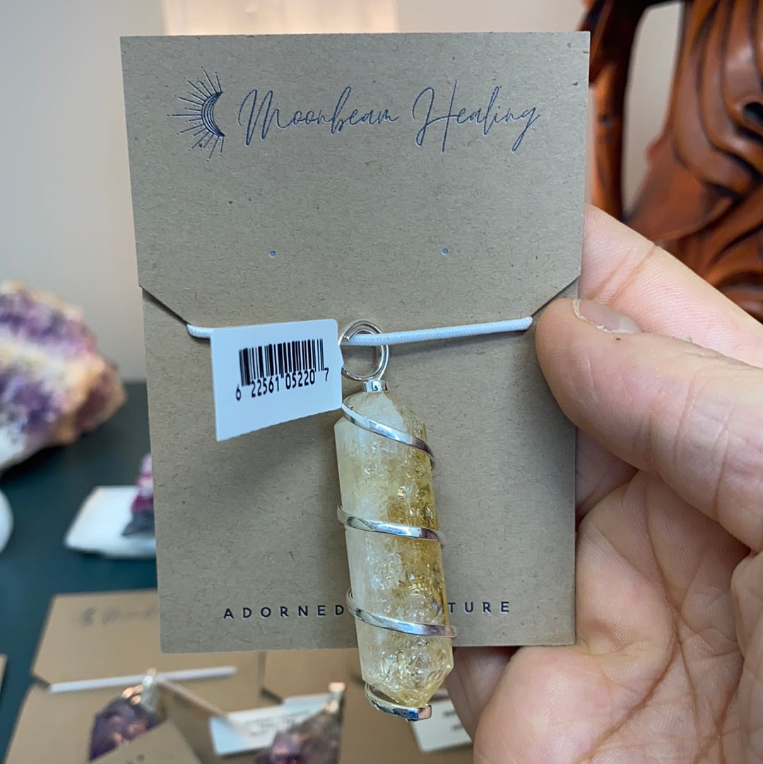 Citrine Silver Wrapped Double Terminated Point Pendant showcasing a unique crystal point wrapped in sterling silver.