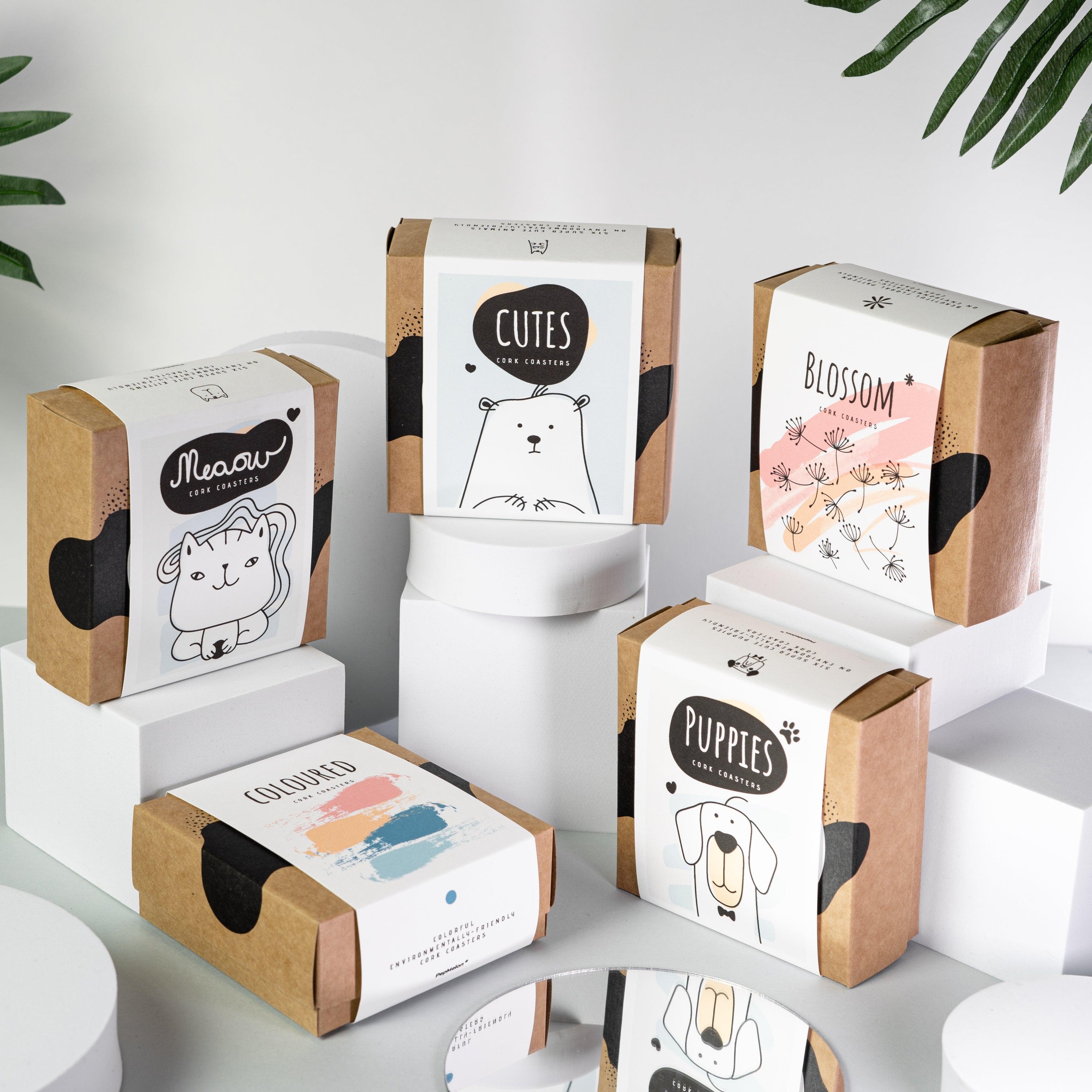 Set of 6 round coloured cork coasters with vibrant patterns, perfect for home decor and protecting surfaces.