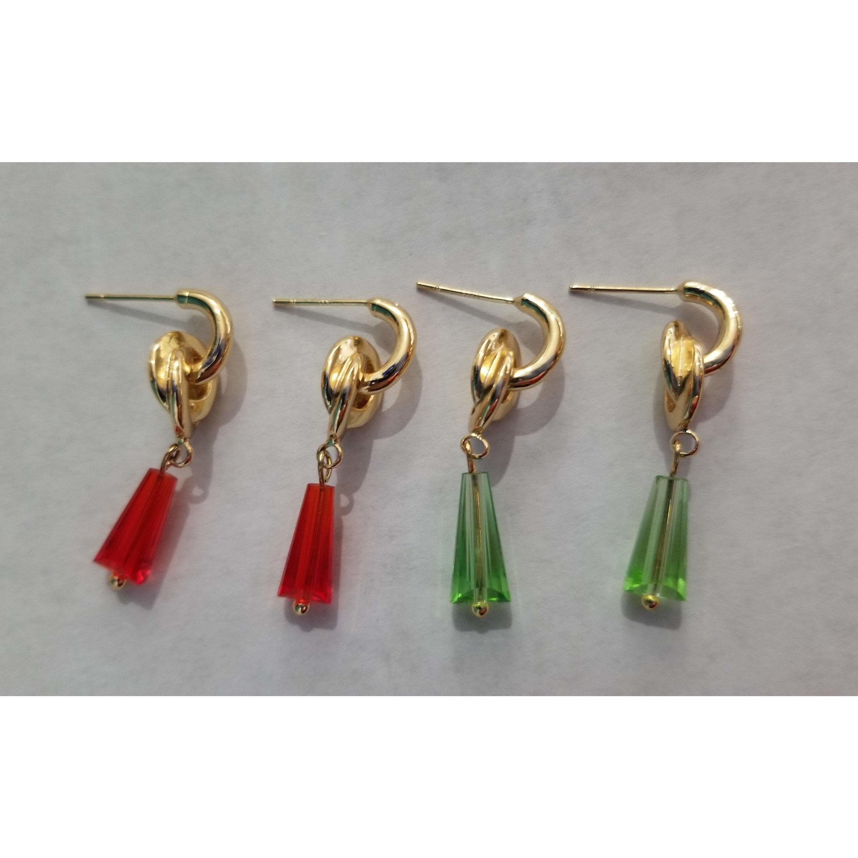 Elegant conical crystal beads on golden knot ear studs, showcasing a trendy brass design with a luxurious 24K gold color plating.