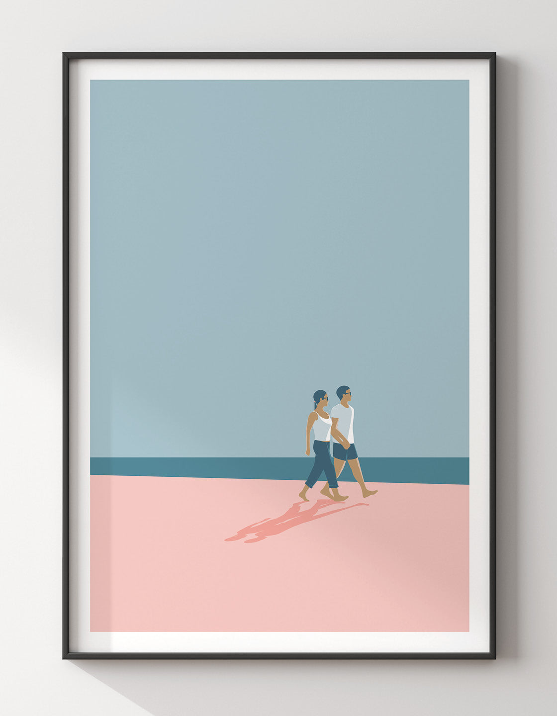 A romantic couple walking hand in hand on a serene beach, capturing minimal holiday vibes.