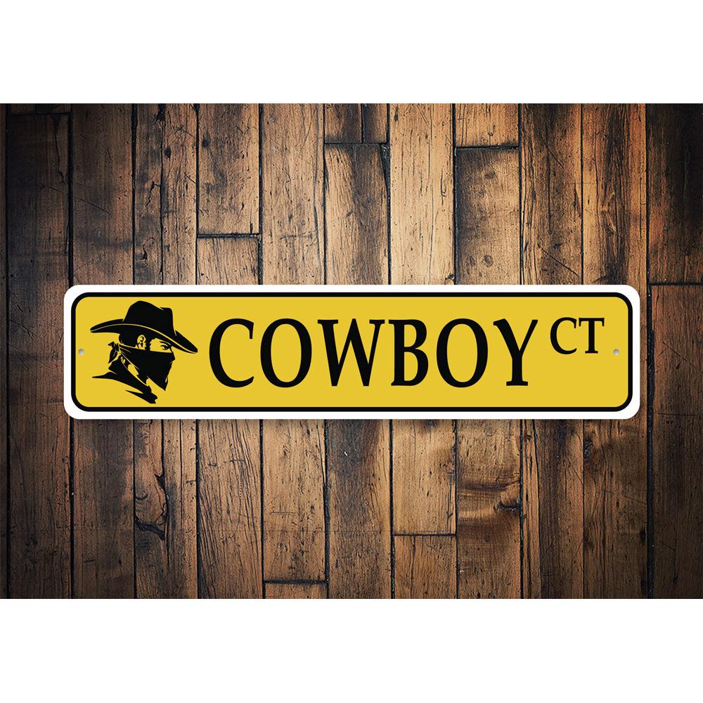 A Cowboy Street Sign made of high-quality aluminum, featuring a rustic design perfect for home decor.