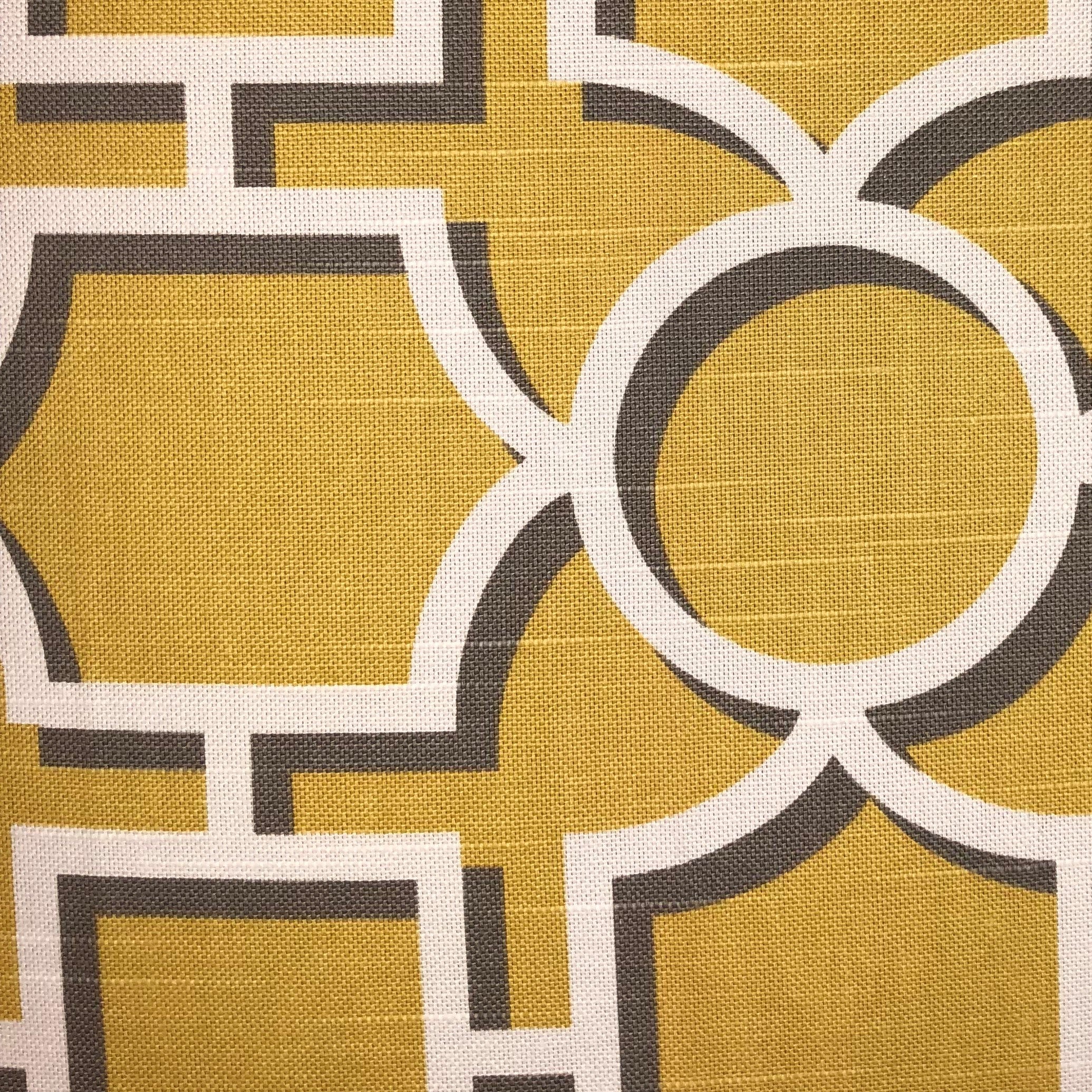 Crane Enclave luxury throw pillow in yellow, beige, and gray with geometric pattern, featuring an invisible zipper and soft cotton fabric.