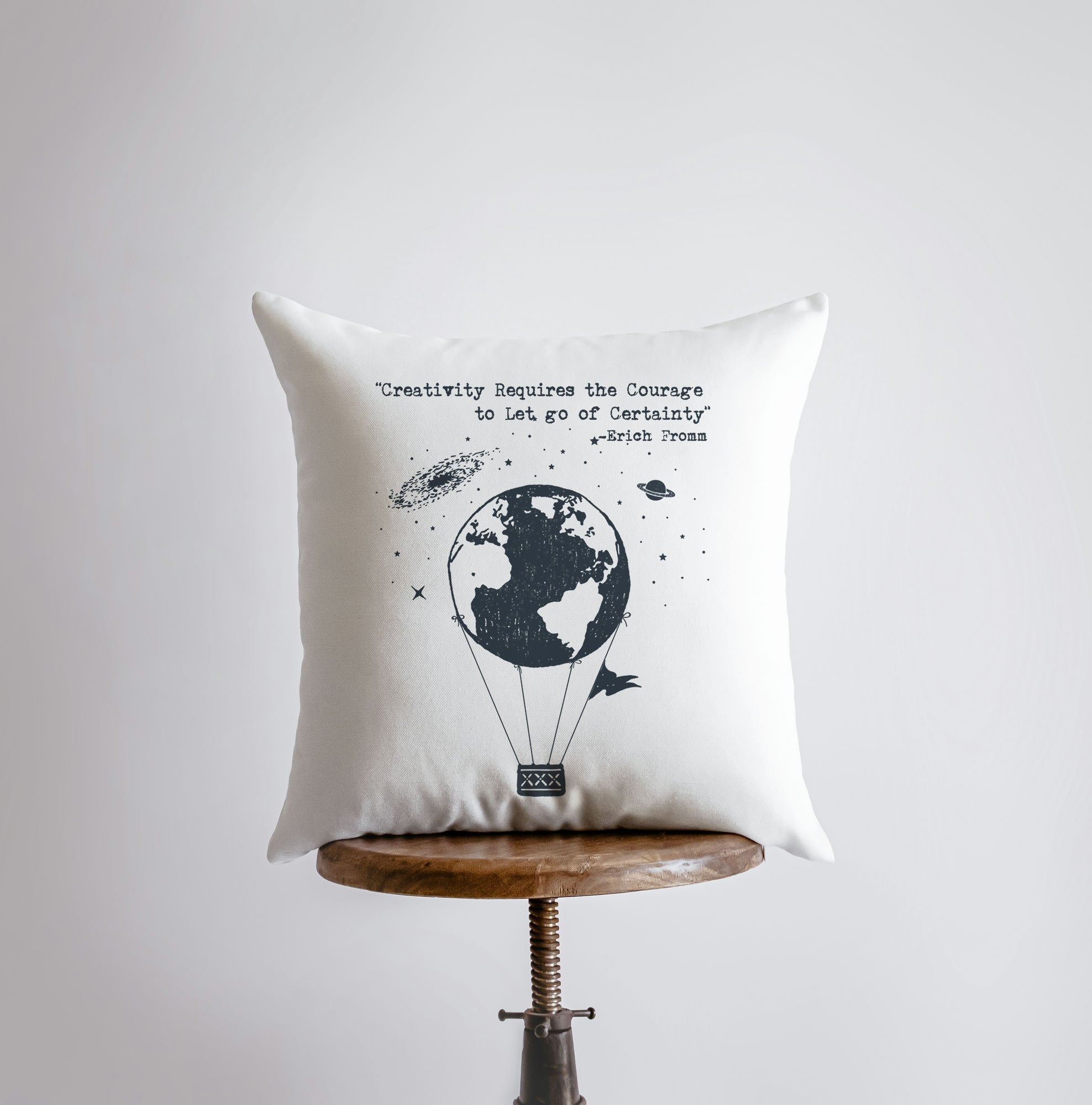 Handmade pillow cover featuring a hot air balloon design with the quote 'Creativity Requires the Courage to Let Go of Certainty' by Erich Fromm.