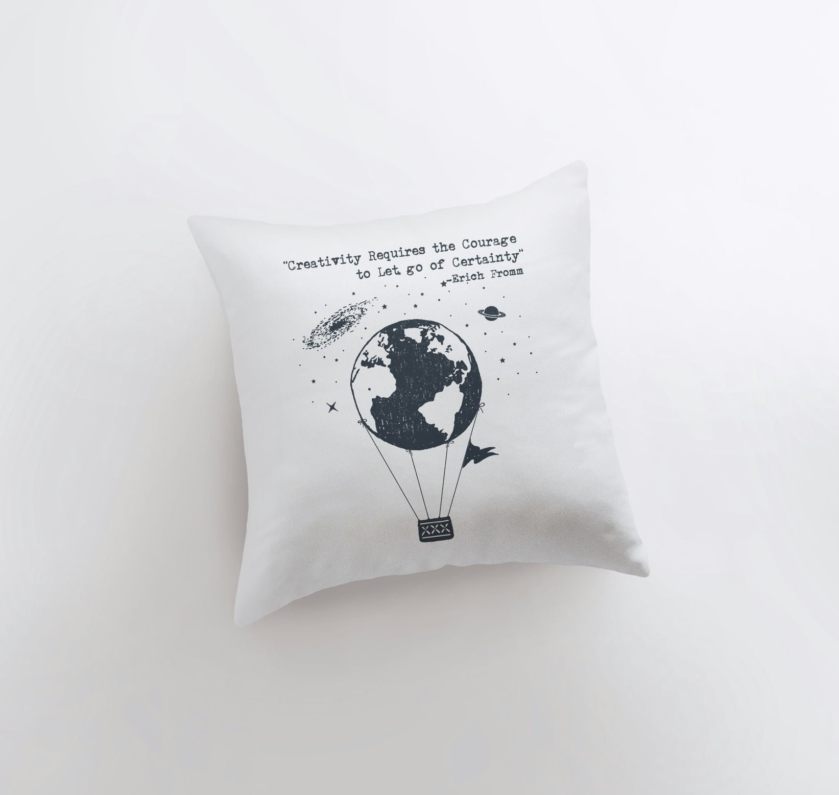 Handmade pillow cover featuring a hot air balloon design with the quote 'Creativity Requires the Courage to Let Go of Certainty' by Erich Fromm.