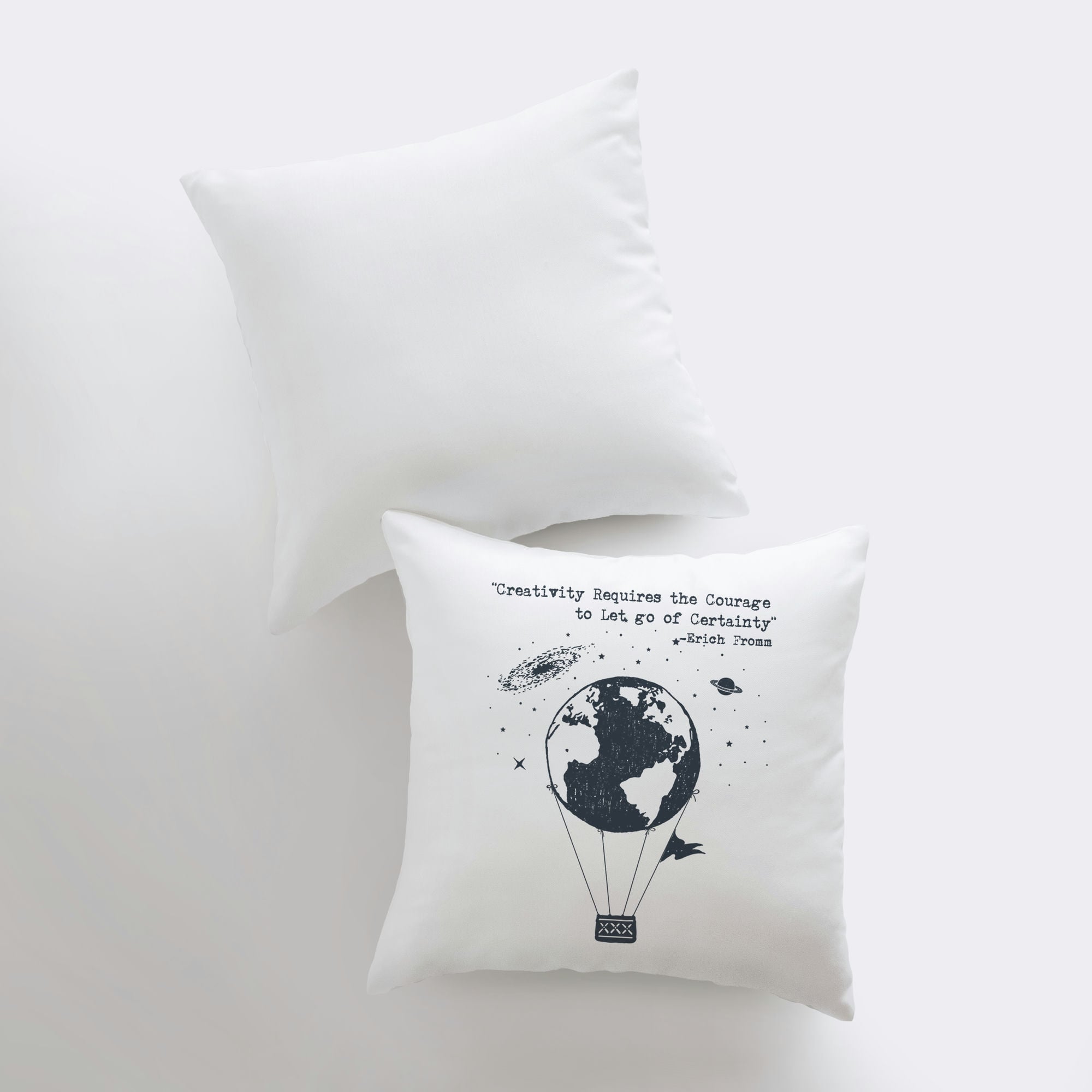 Handmade pillow cover featuring a hot air balloon design with the quote 'Creativity Requires the Courage to Let Go of Certainty' by Erich Fromm.