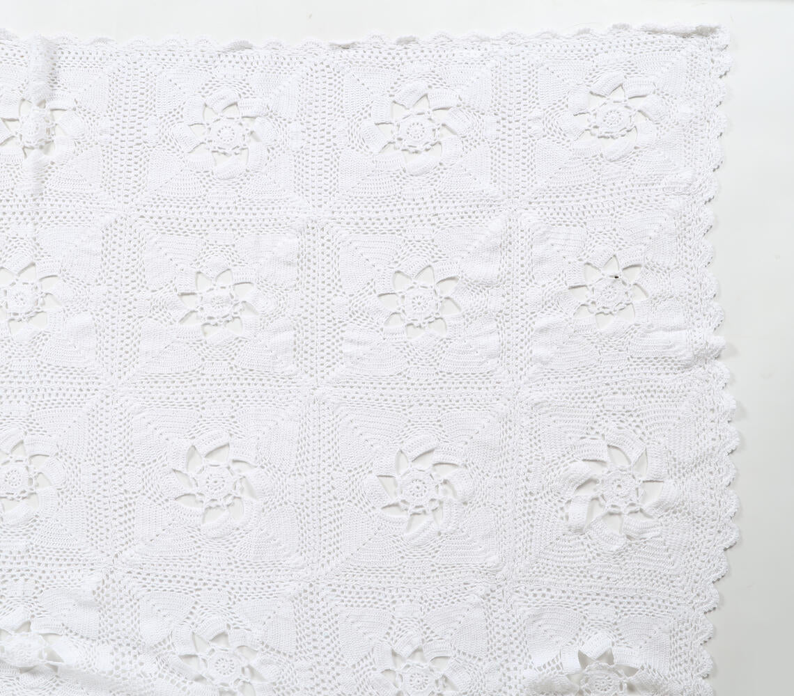 A beautifully crafted Crochet Cotton Floral Throw in beige, showcasing intricate floral patterns and soft texture, perfect for home decor.