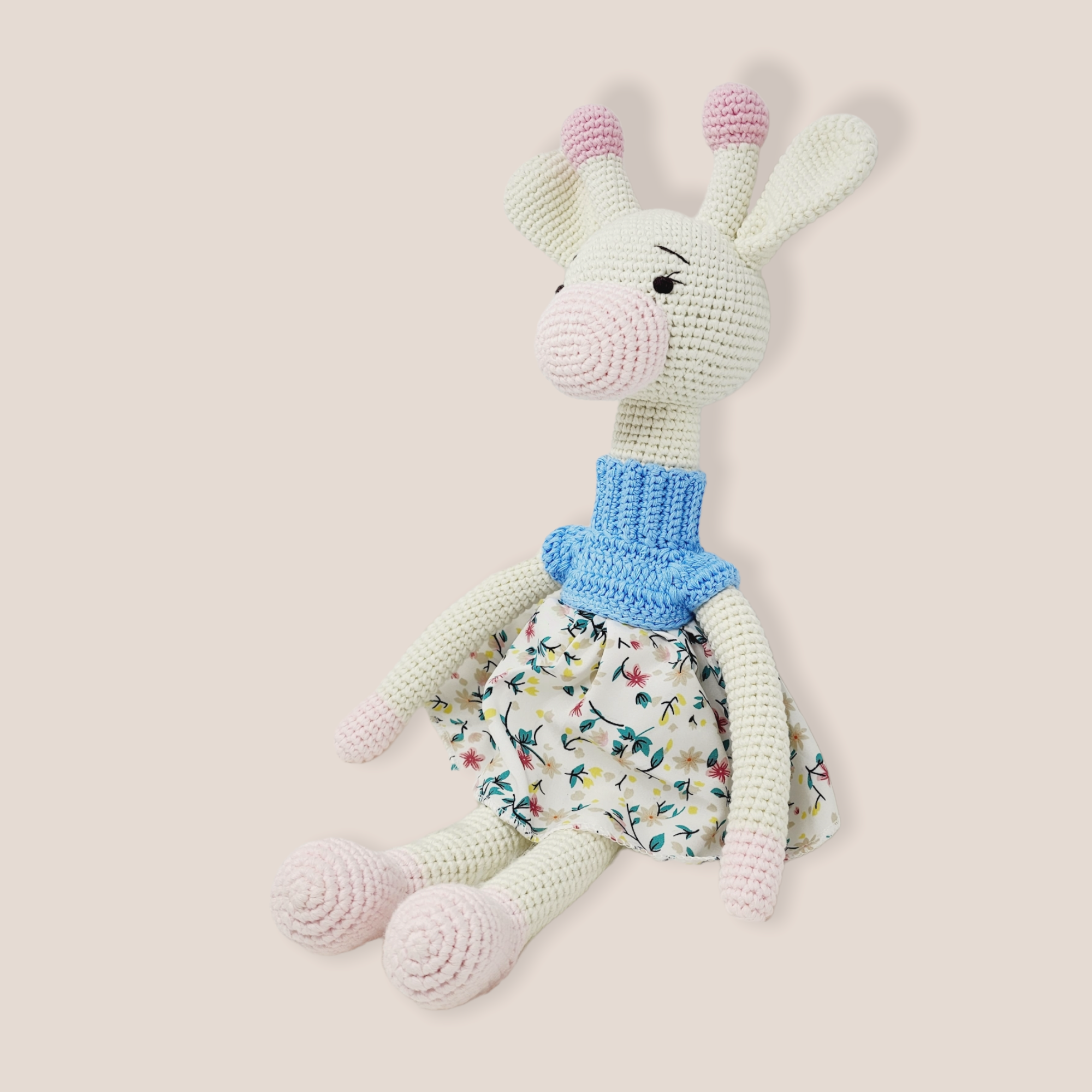 Large crochet giraffe stuffed animal toy in a dress, made from 100% cotton yarn, showcasing vibrant colors and intricate handmade details.