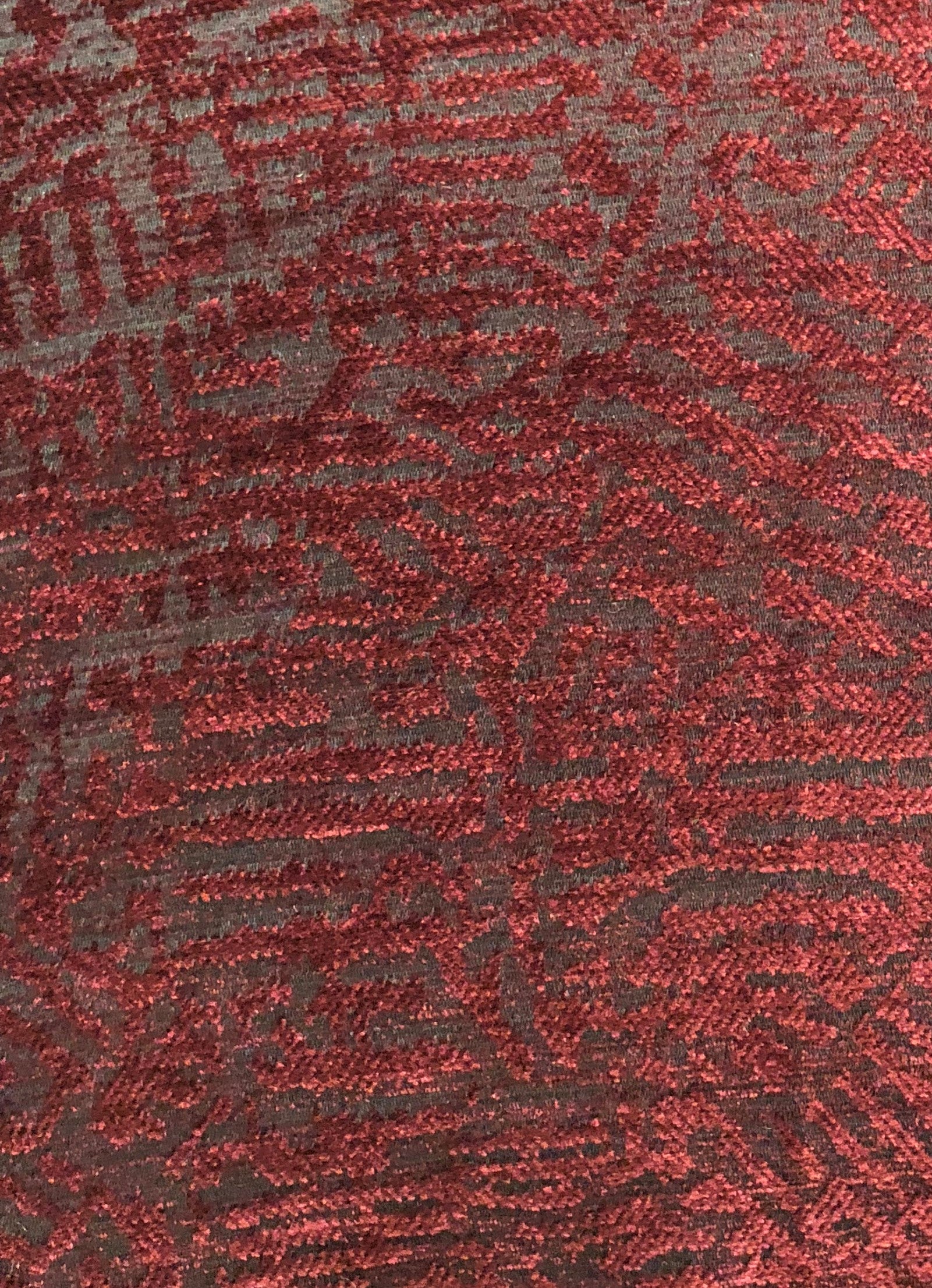 Crushed Wine Luxury Throw Pillow in Dark Red, showcasing its rich color and elegant design with an invisible zipper.