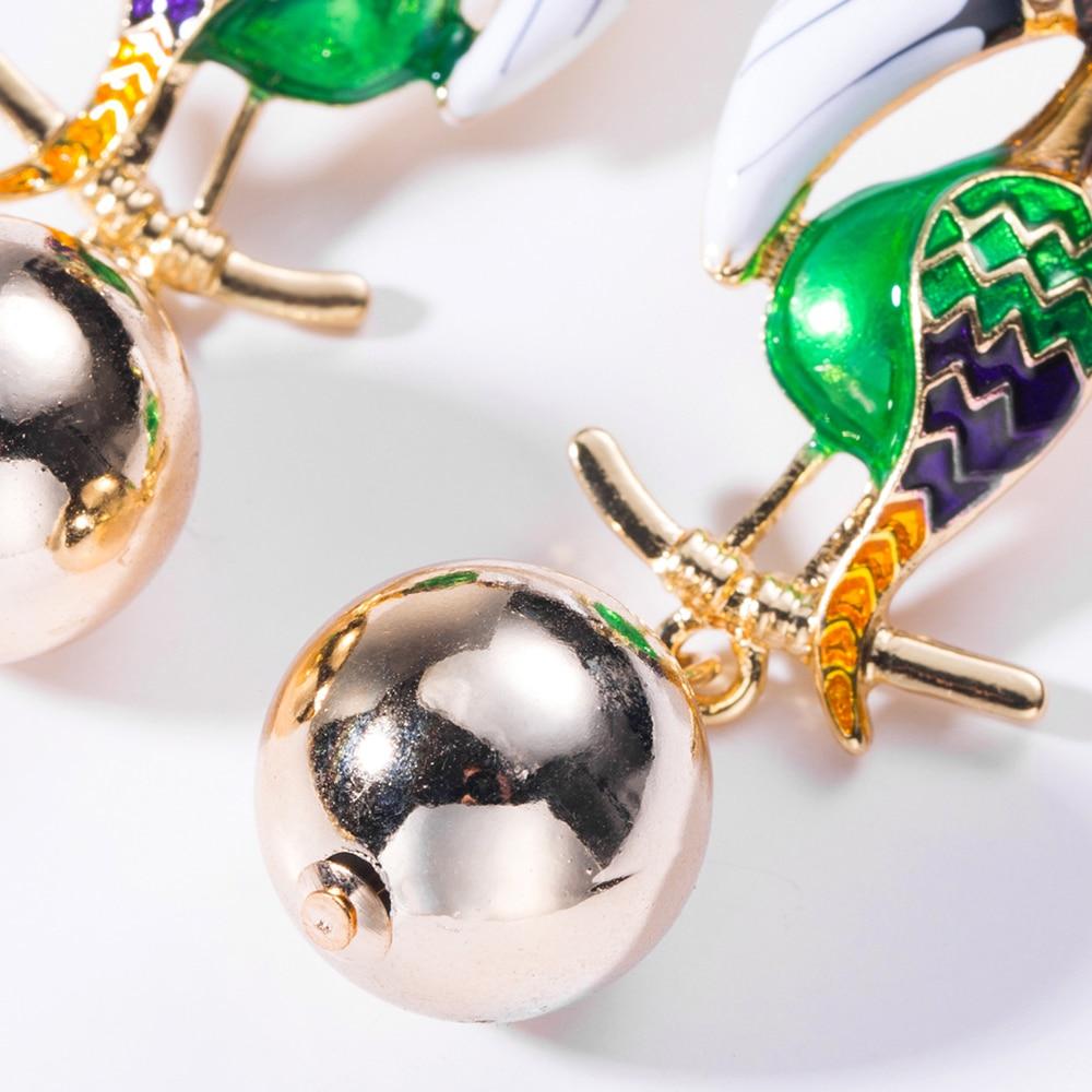 Elegant Crystal Parrot Tassel Earrings featuring a vibrant design and dangle style, perfect for women.