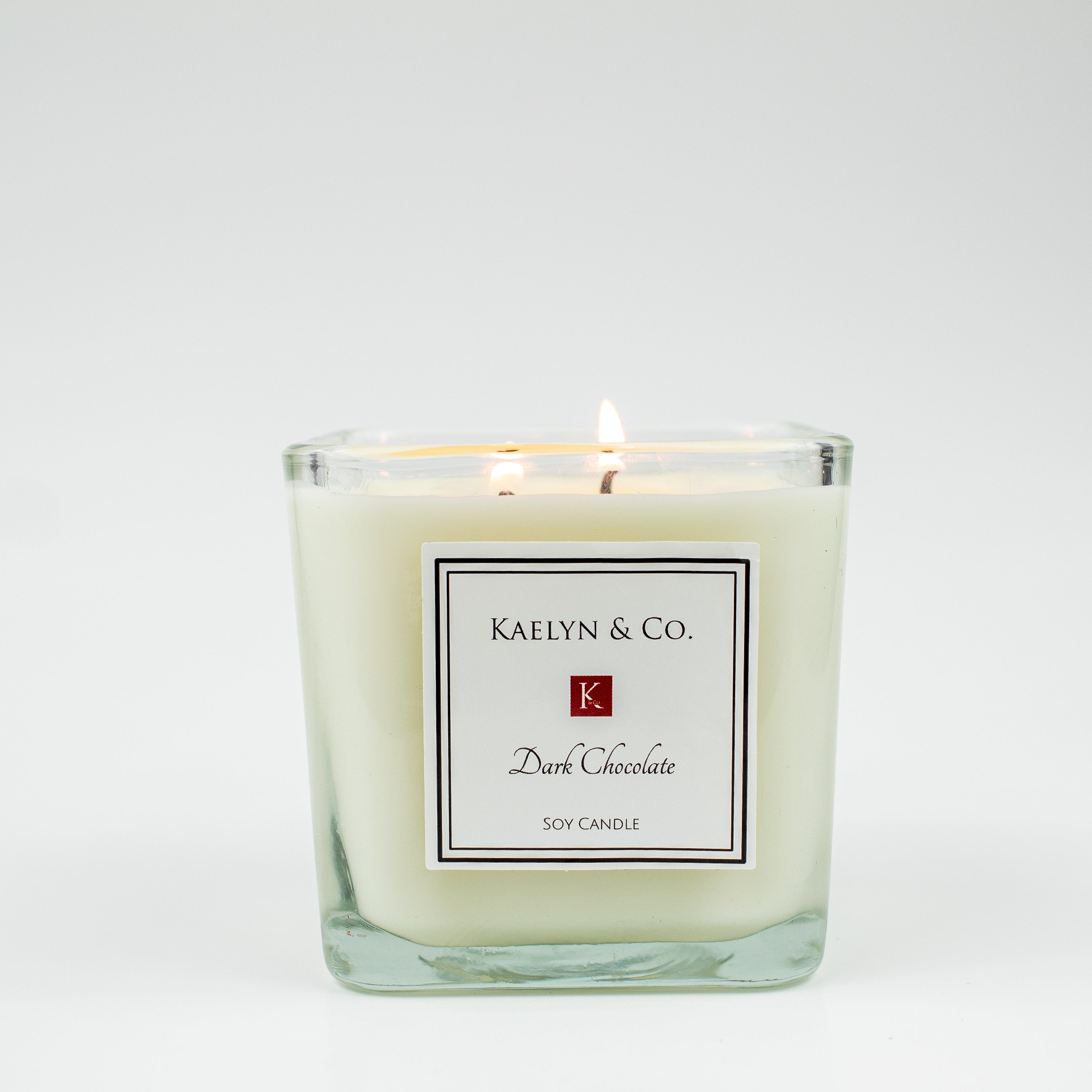 Dark Chocolate Medium Cube Candle in a stylish cube shape, showcasing its rich brown color and double wicks, perfect for home decor.