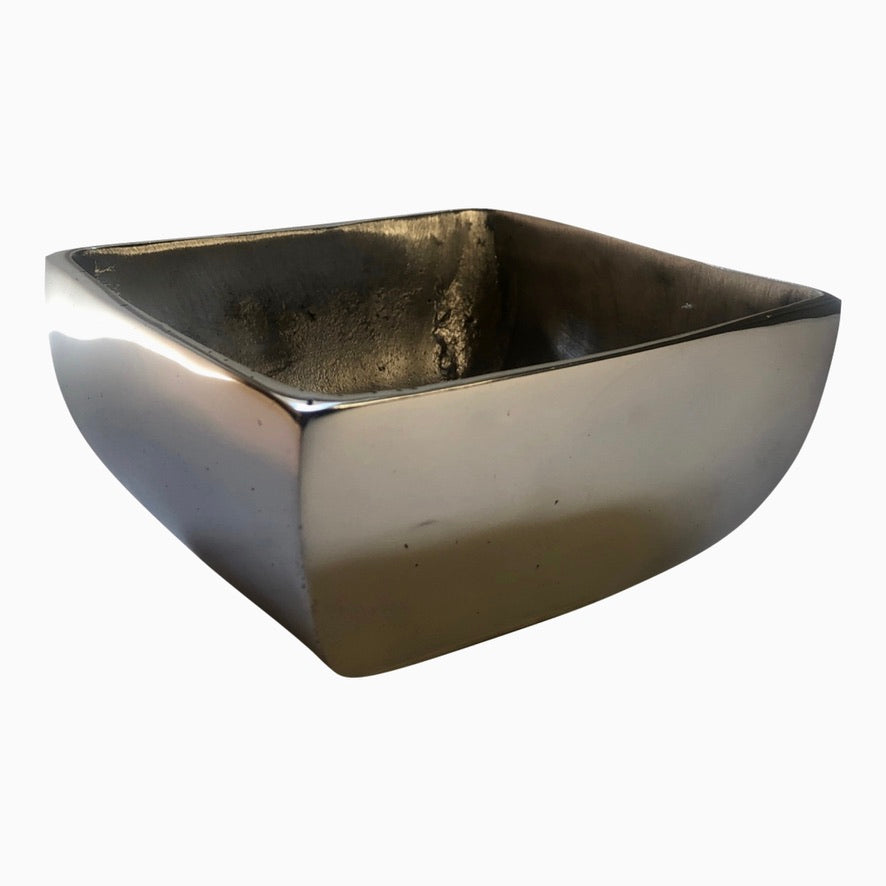 A sleek, minimalist decorative flower vase made from recycled aluminum alloy, showcasing a smooth finish and clean lines, perfect for various plants.