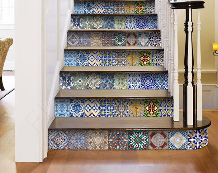 A colorful set of 24 decorative peel and stick tile stickers displayed on a smooth surface, showcasing various unique designs.