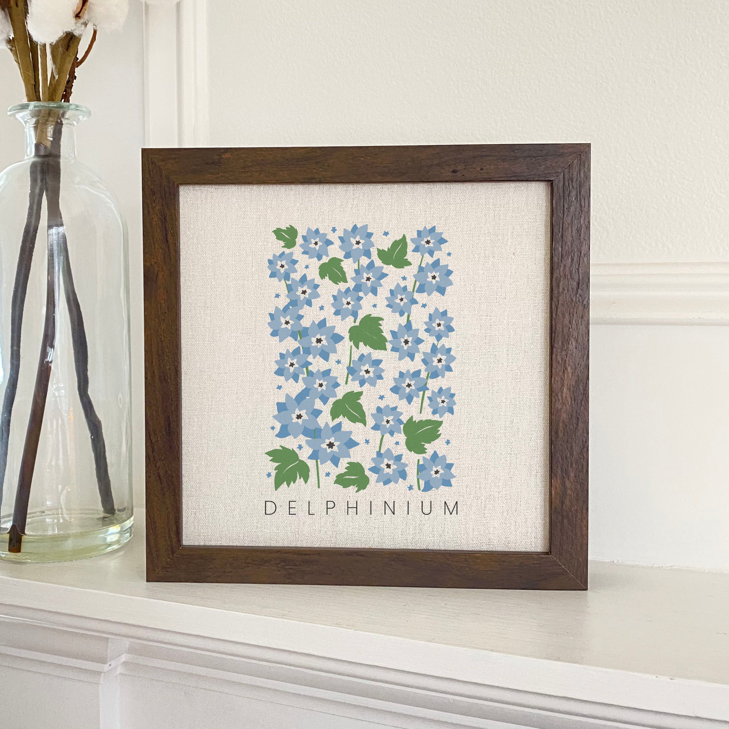 Delphinium framed sign with a stylized wood frame, featuring eco-friendly printing on a linen-look background.