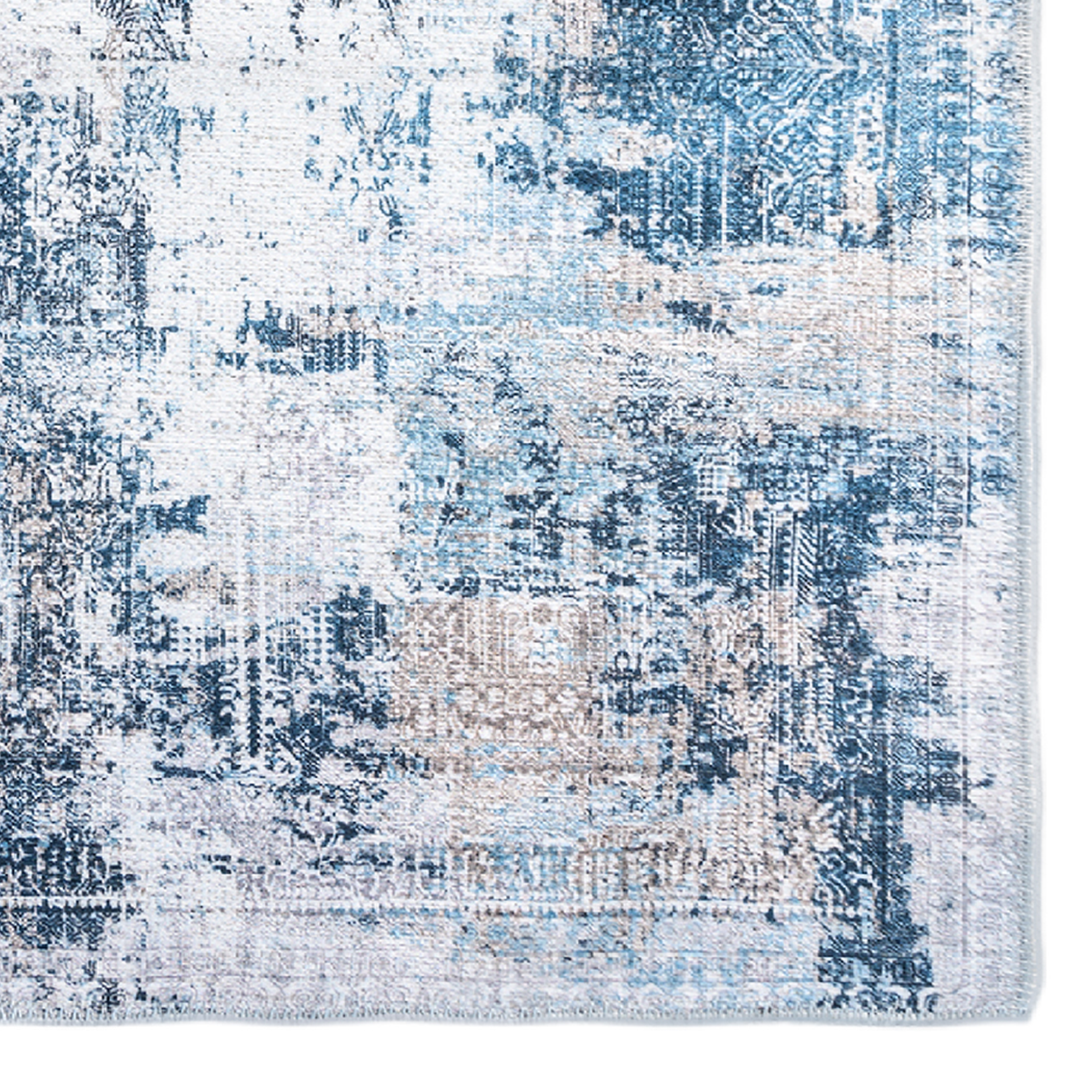 Deniza Rug featuring Mediterranean-inspired design in blue and aqua tones, showcasing a weathered and vintage look.