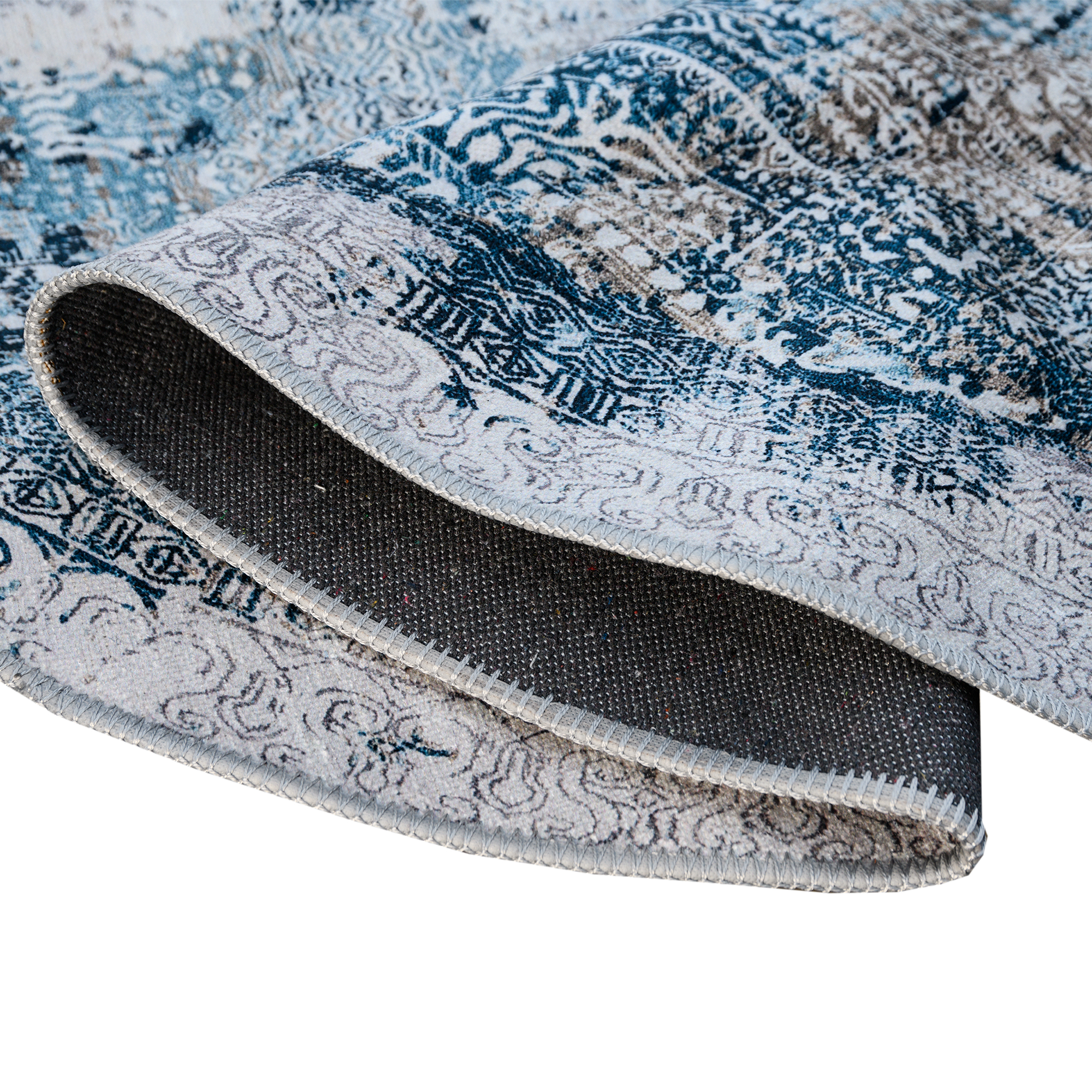 Deniza Rug featuring Mediterranean-inspired design in blue and aqua tones, showcasing a weathered and vintage look.