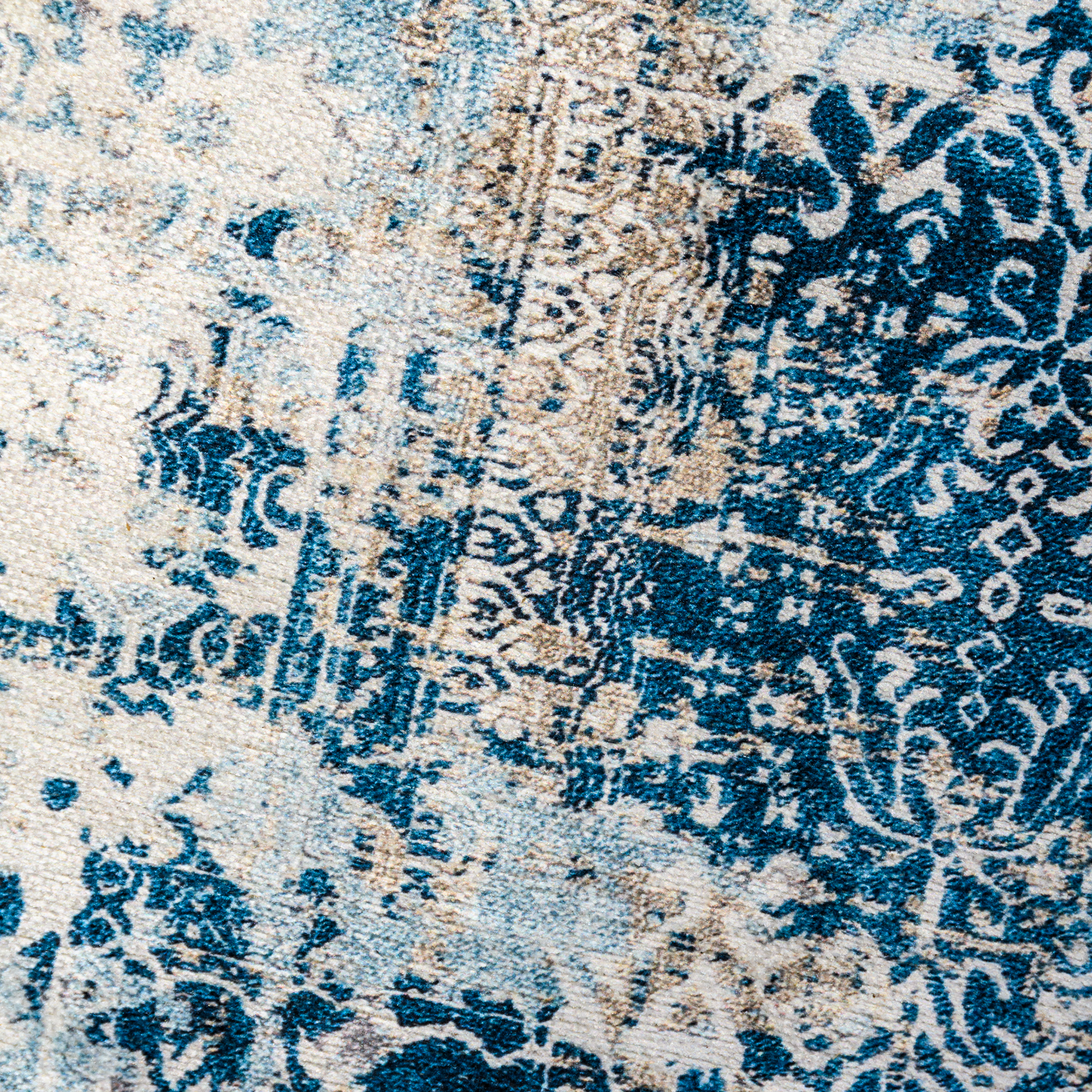 Deniza Rug featuring Mediterranean-inspired design in blue and aqua tones, showcasing a weathered and vintage look.