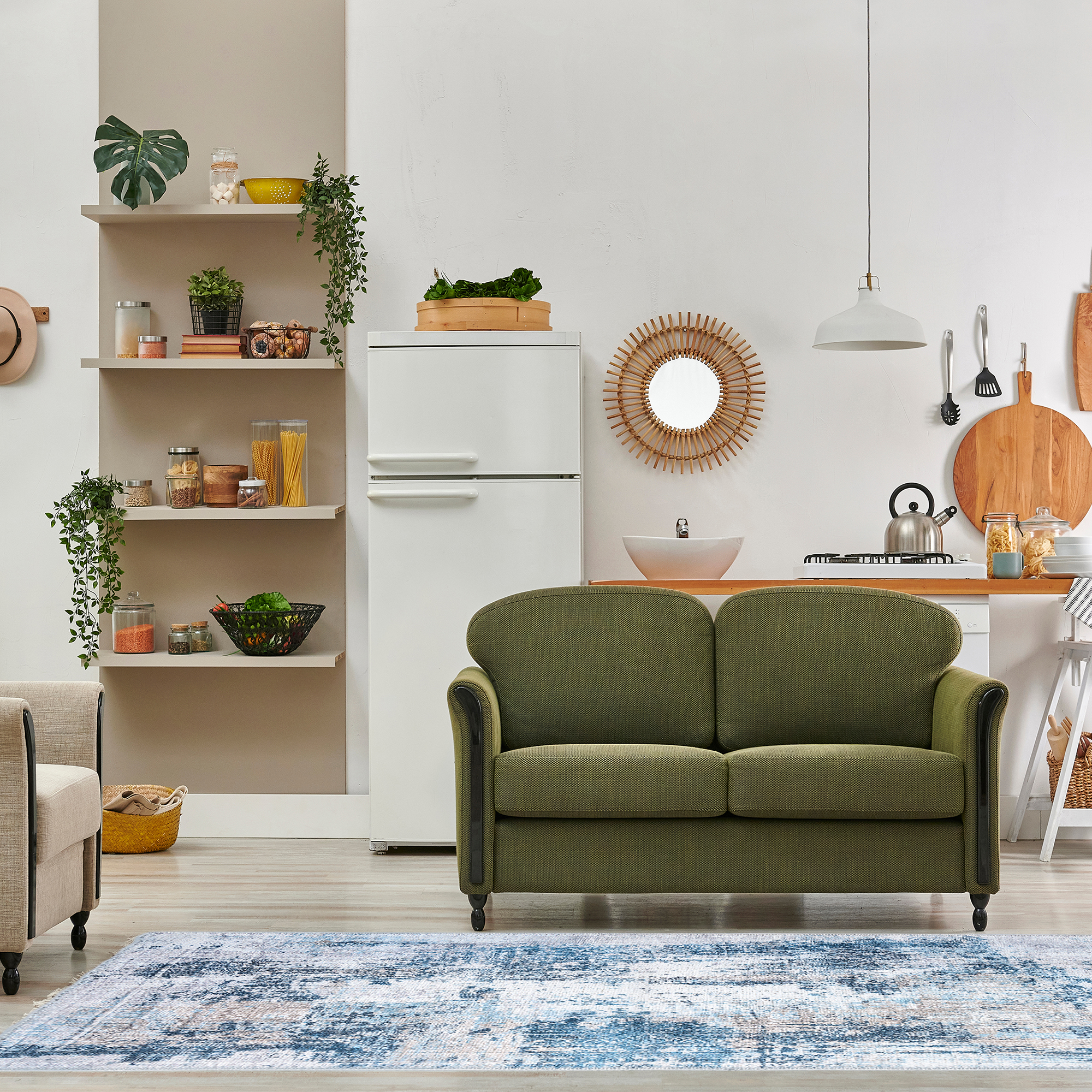 Deniza Rug featuring Mediterranean-inspired design in blue and aqua tones, showcasing a weathered and vintage look.