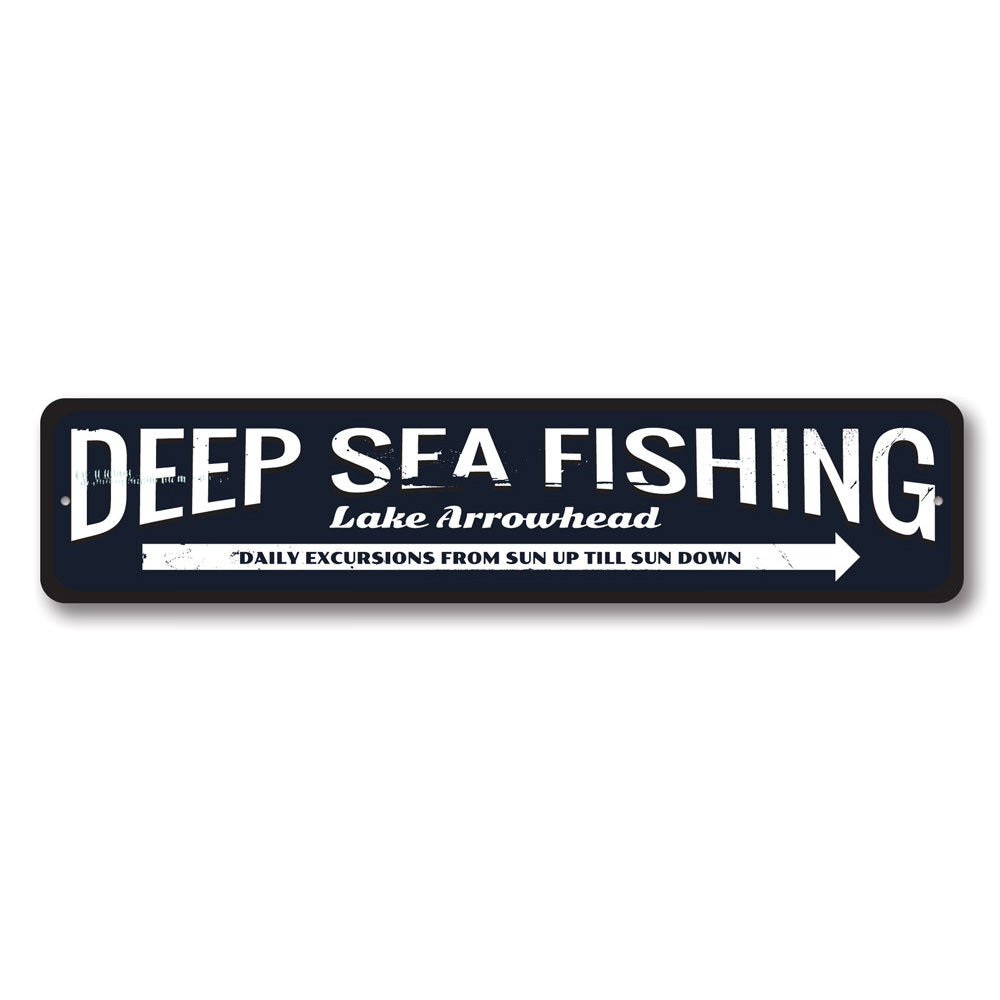 Deep Sea Fishing Arrow Sign made of durable aluminum, featuring a nautical design perfect for coastal decor.