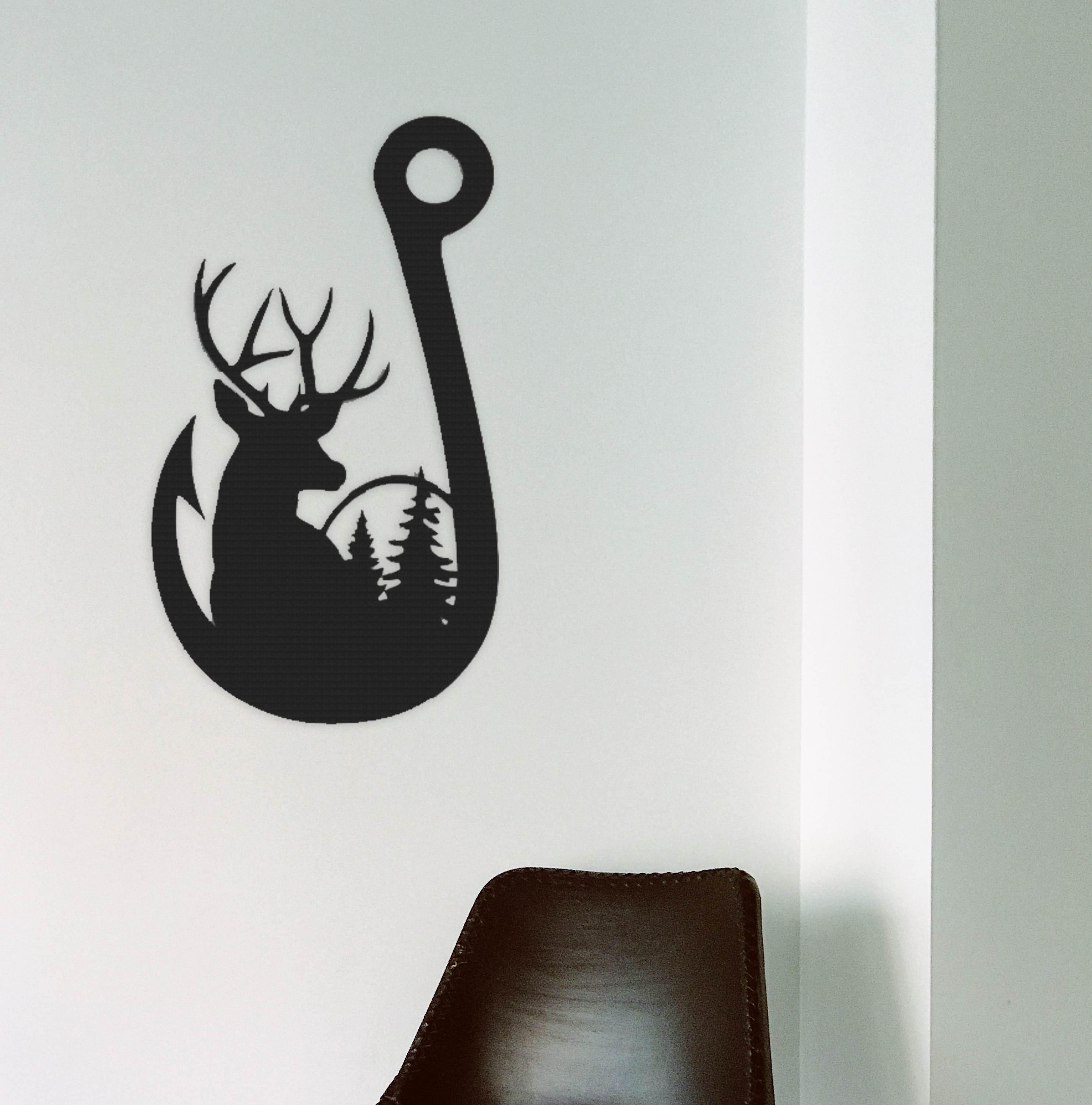 Deer Fishing Hook metal wall art showcasing a unique design combining deer and fishing elements, crafted from durable steel.
