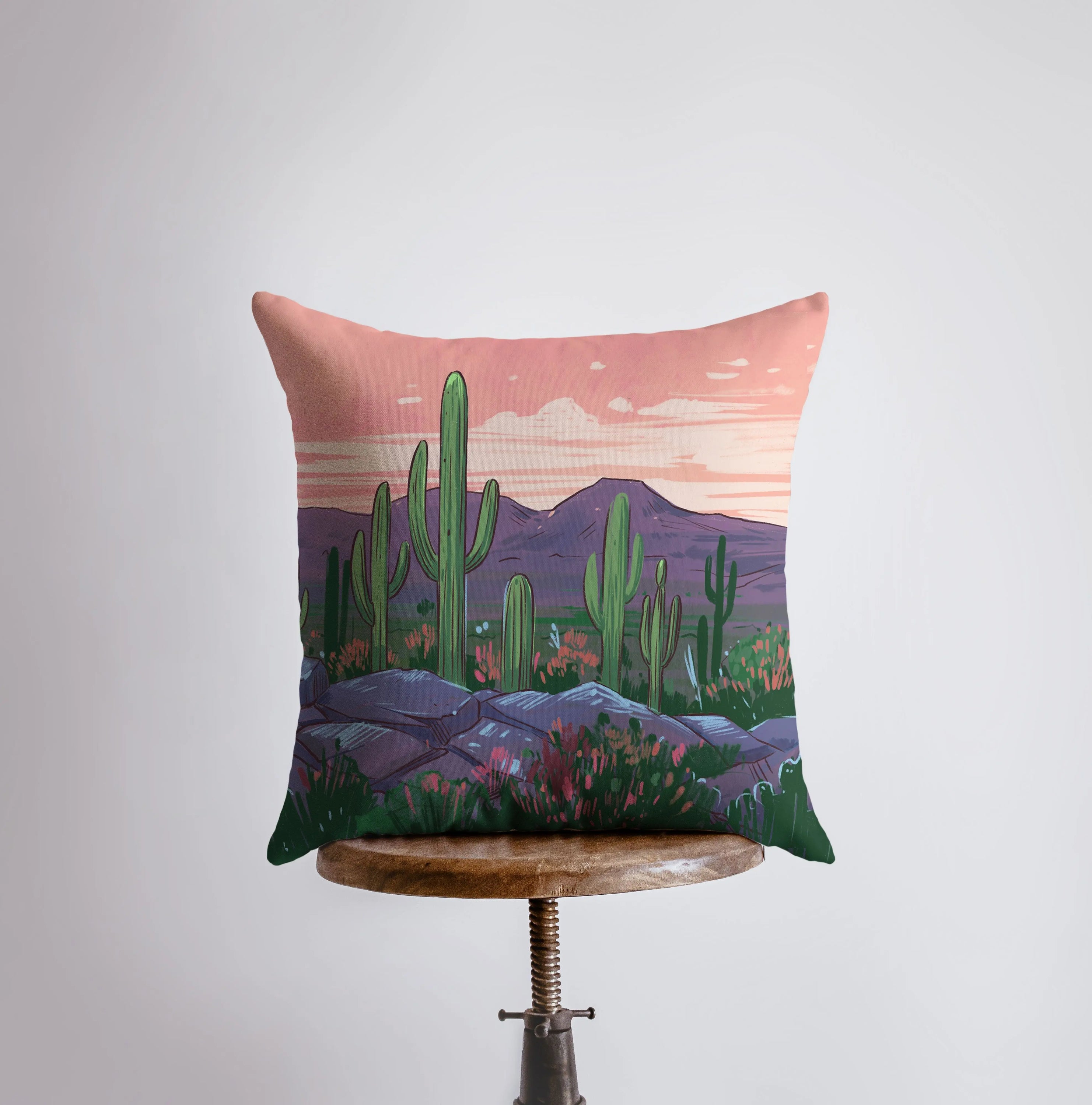 Arizona landscape pillow showcasing sunrise and sunset scenes, perfect for desert-themed decor.