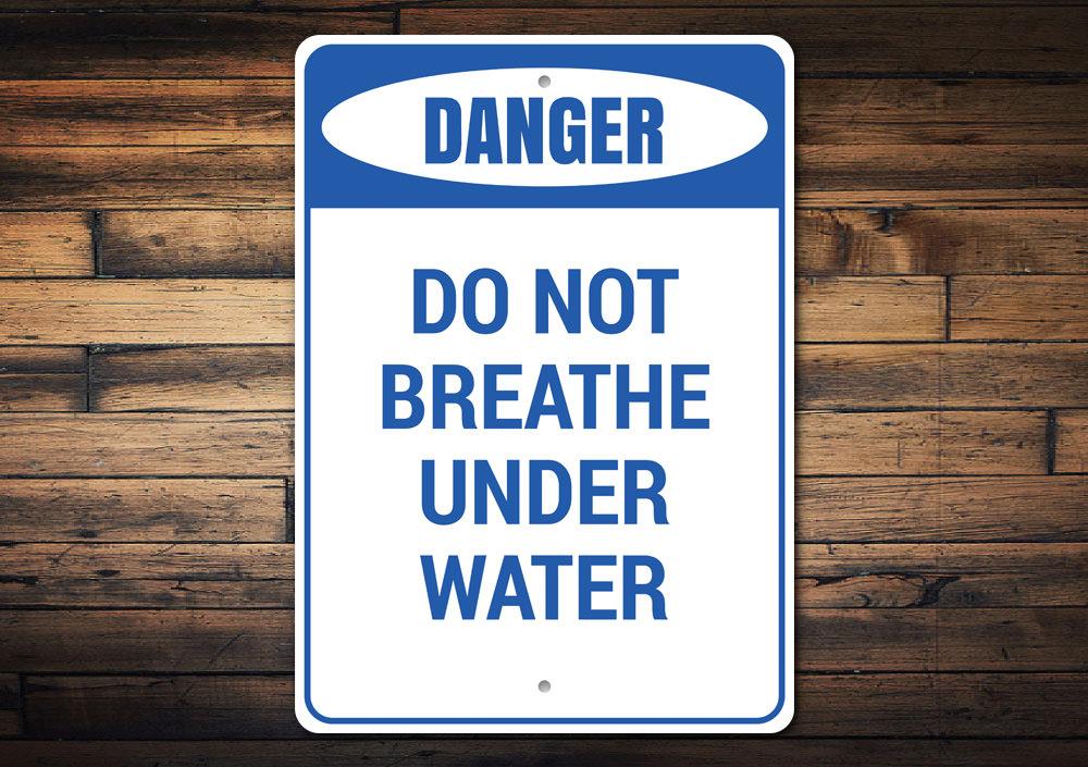 Do Not Breathe Under Water Sign made of high-quality aluminum, featuring a bold design suitable for indoor and outdoor decor.