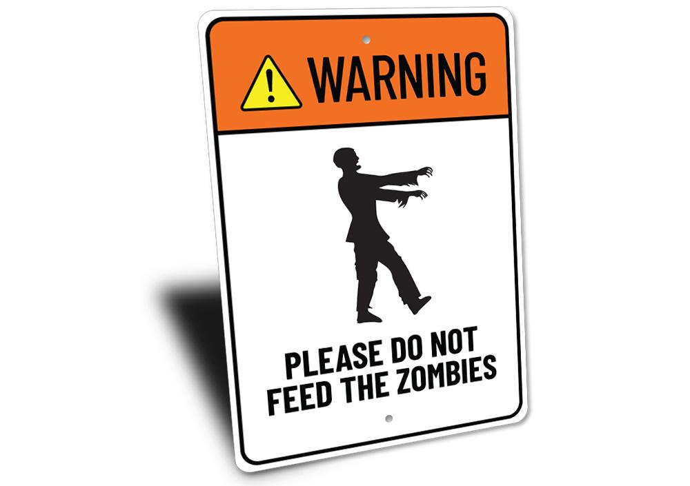 A decorative Do Not Feed Zombies sign made of aluminum, featuring spooky graphics perfect for Halloween decor.