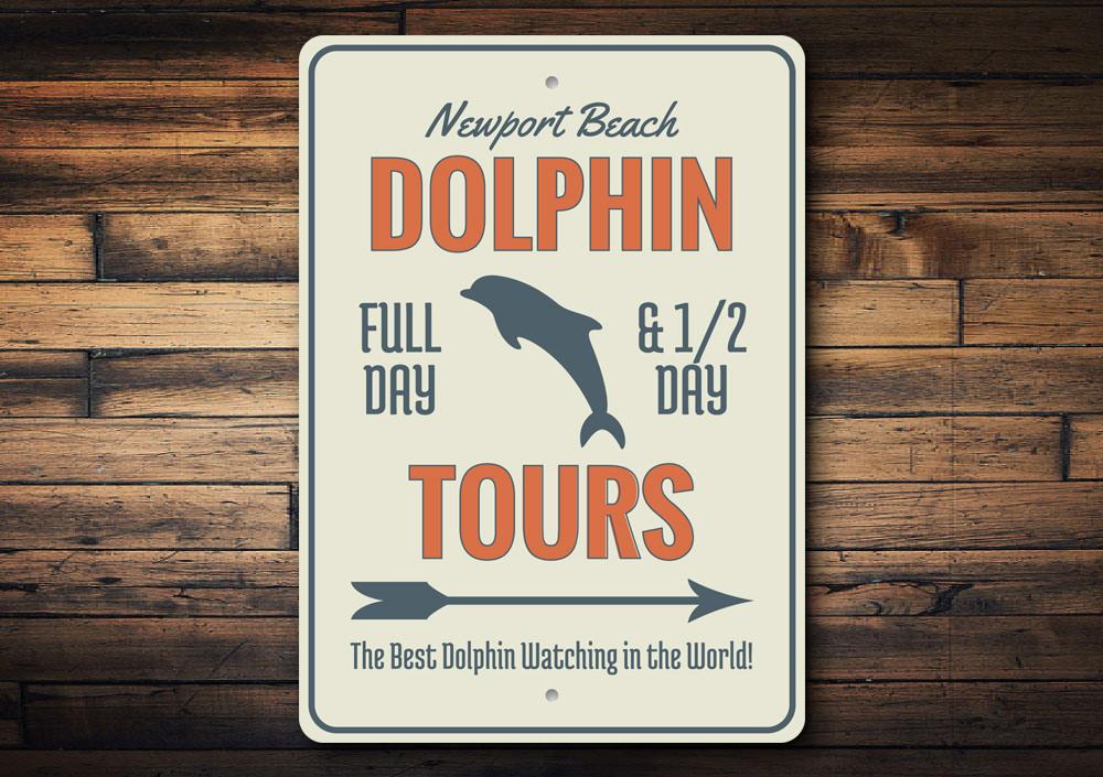 Dolphin Tours Arrow Sign made of high-quality aluminum, featuring a vibrant design perfect for beach-themed decor.