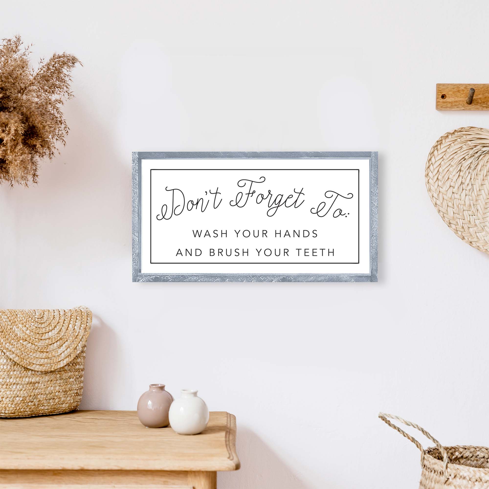 A rustic wood sign with the message 'Don't Forget To Wash Your Hands And Brush Your Teeth', featuring a stained pine frame and waterproof design.