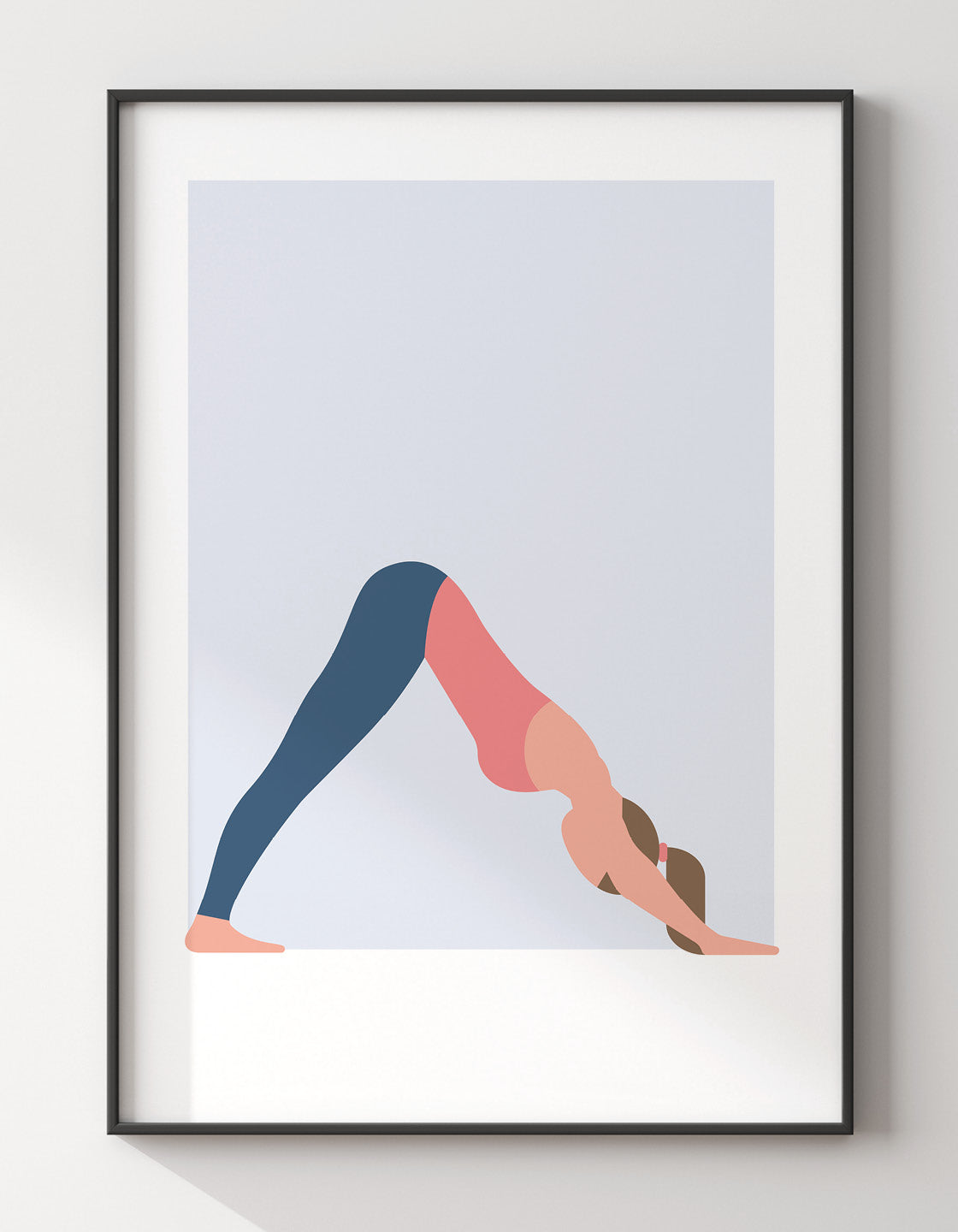 A person demonstrating the Downward Dog yoga pose, showcasing proper alignment and form.