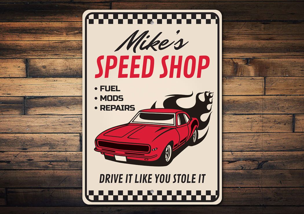 Drive it Like You Stole It Funny Speed Shop Sign made of aluminum, featuring humorous text and pre-drilled holes for easy mounting.