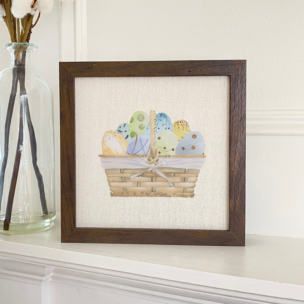 Easter Egg Basket framed sign with a wood frame and linen-look background, perfect for seasonal decor.