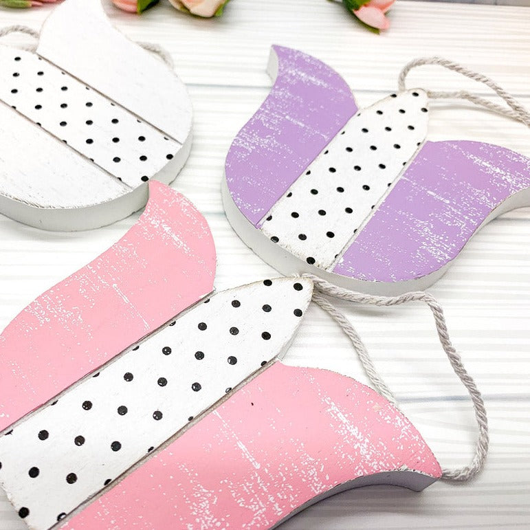 Handmade wooden Easter ornaments featuring a Tulip and Easter Egg design, double-sided with polka-dot and gingham patterns.