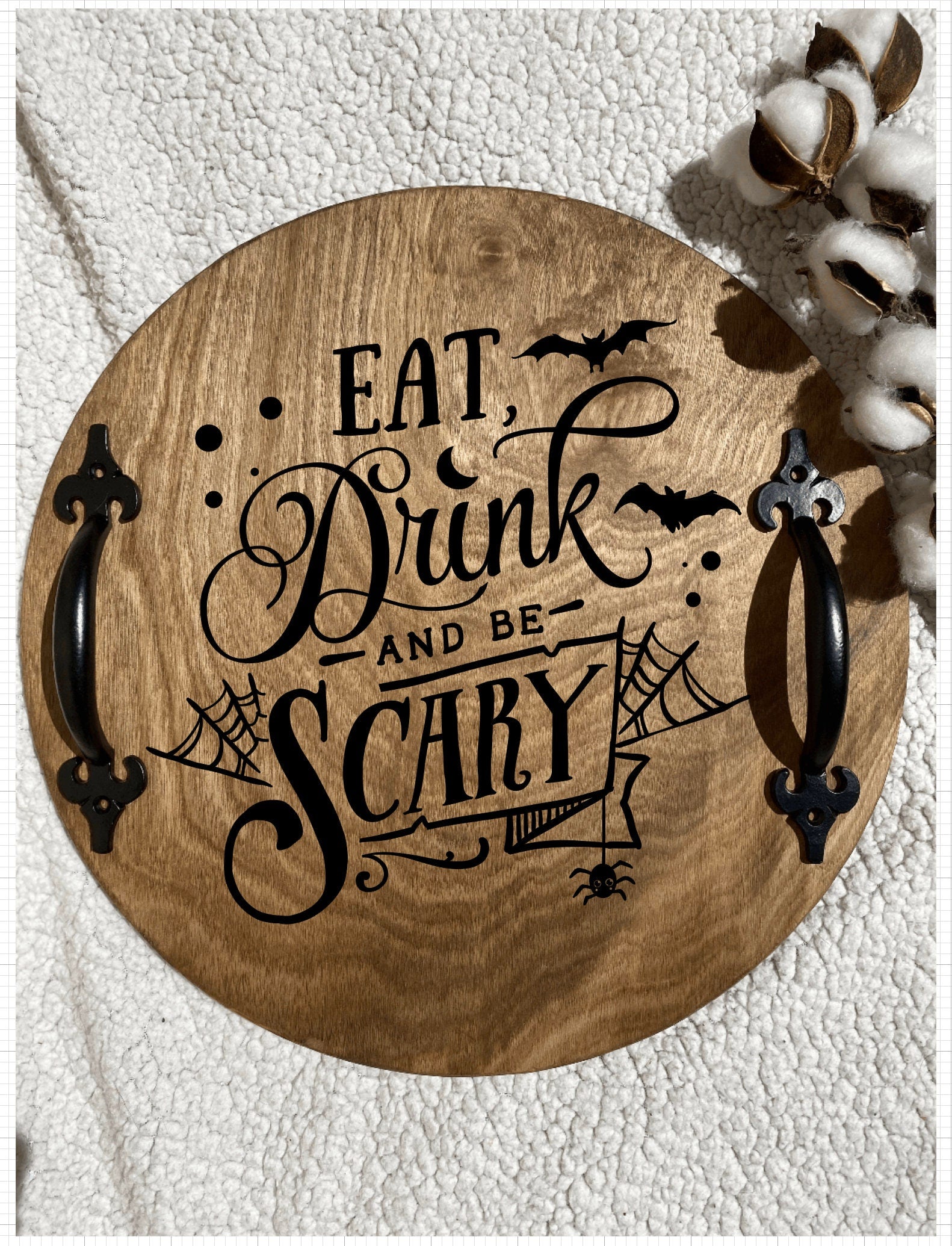 Handmade wooden serving tray with 'Eat Drink and Be Scary' design, featuring a rich chestnut stain and black metal handles.