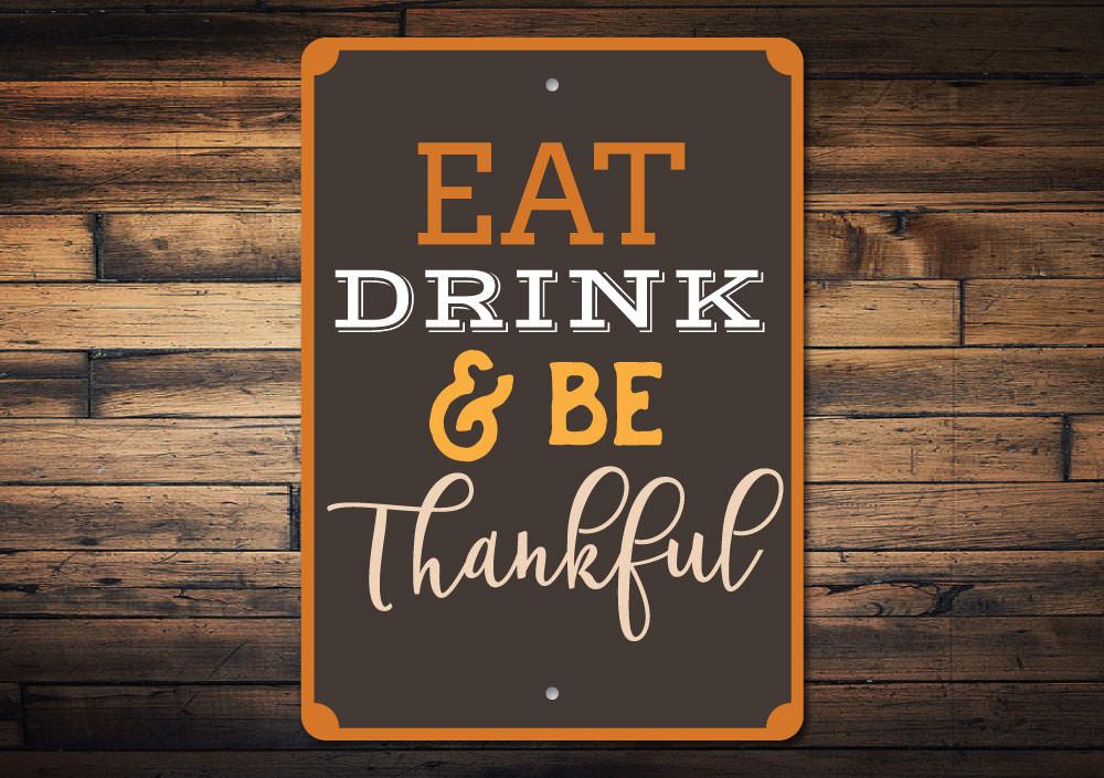Eat Drink Be Thankful decorative sign made of high-quality aluminum, featuring a warm and inviting design suitable for any room.