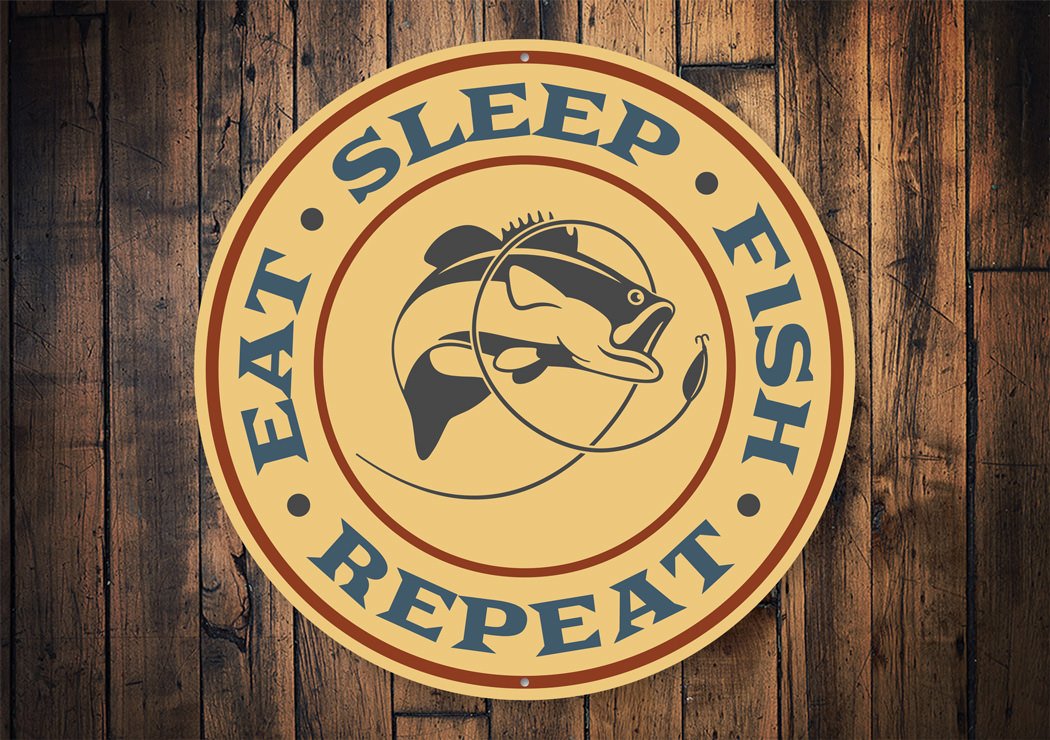 Eat Sleep Fish Repeat Fishing Sign made of high-quality aluminum, featuring a rustic design perfect for lakehouse decor.